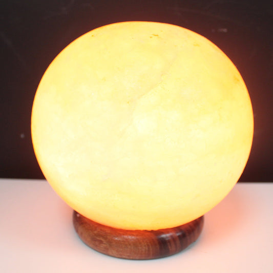 Hand Carved 240v Himalayan Salt Crystal Lamp with Base - Natural / Round / 3.5Kg - 4Kg product packaging on clean background from Quintessential Holistic Health Ltd