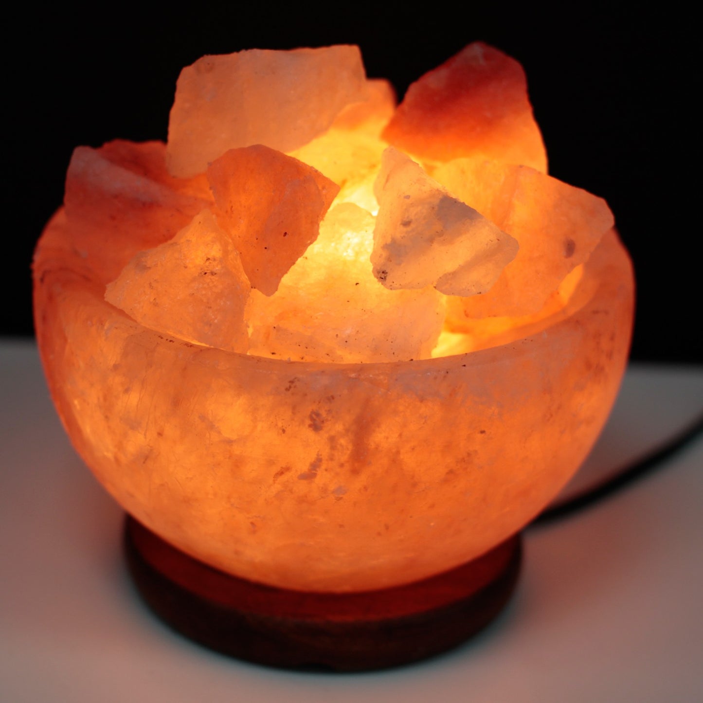 Hand Carved 240v Himalayan Salt Crystal Lamp with Base - Natural / Fire Bowl / 3Kg product packaging on clean background from Quintessential Holistic Health Ltd