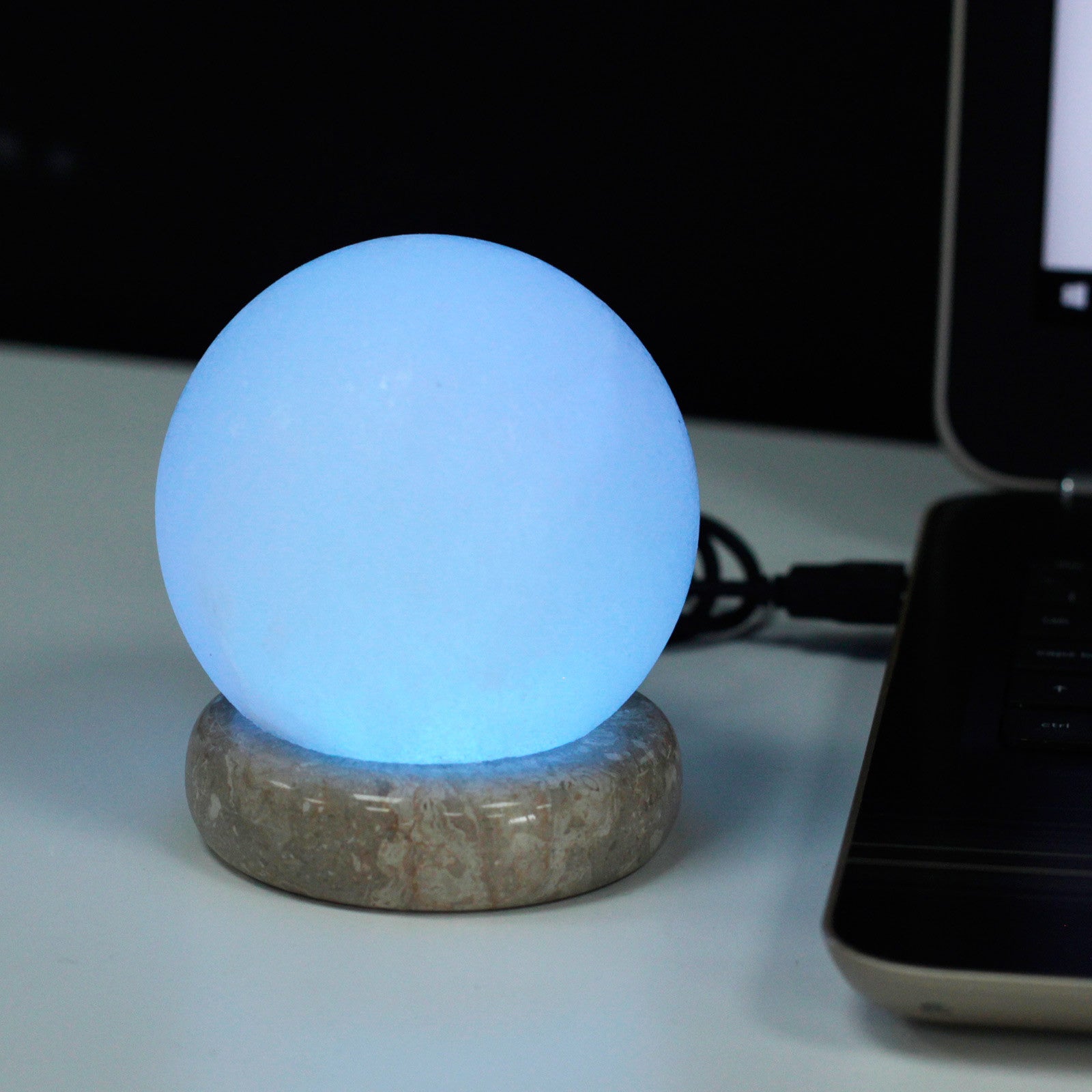 Hand Carved USB Himalayan Salt Crystal Lamp with Base - White and Natural / Round / Multicoloured Light product packaging on clean background from Quintessential Holistic Health Ltd