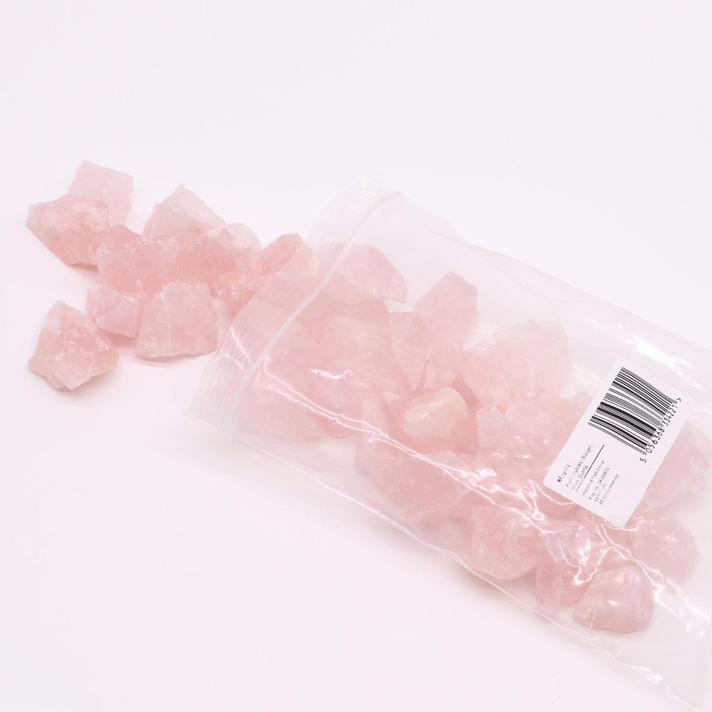 500g Raw Crystals - Rose Quartz product packaging on clean background from Quintessential Holistic Health Ltd
