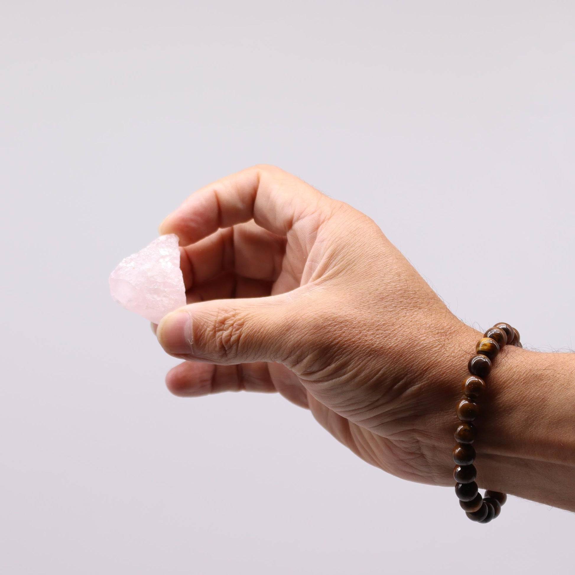 500g Raw Crystals - Rose Quartz product packaging on clean background from Quintessential Holistic Health Ltd