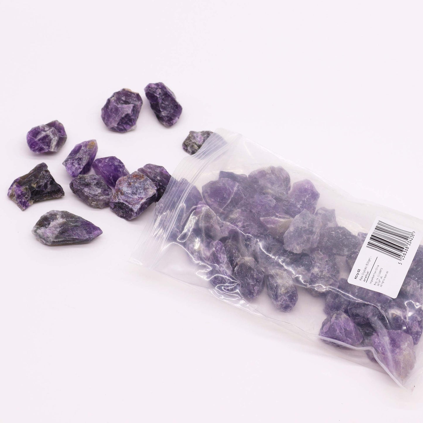 500g Raw Crystals - Amethyst product packaging on clean background from Quintessential Holistic Health Ltd