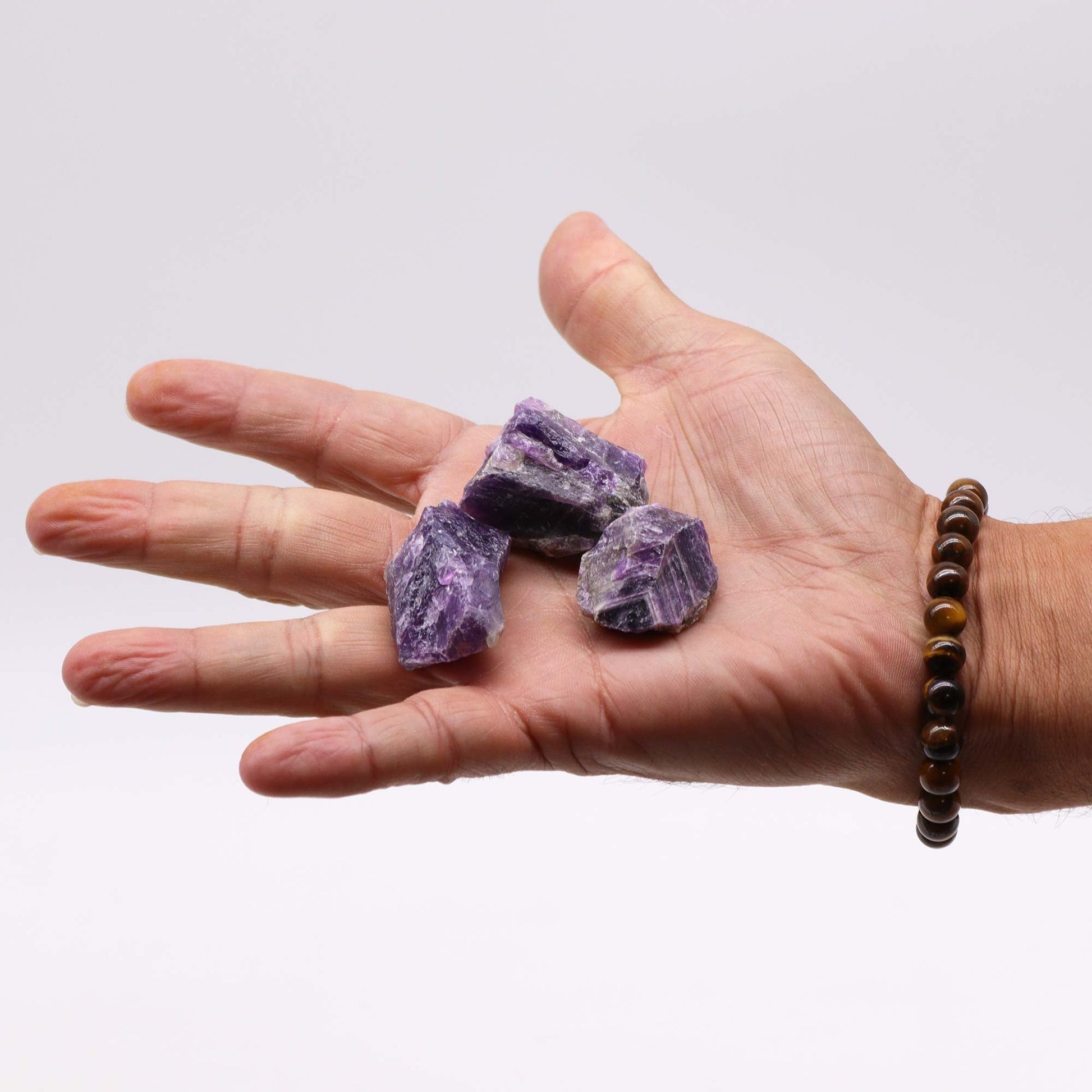 500g Raw Crystals - Amethyst product packaging on clean background from Quintessential Holistic Health Ltd
