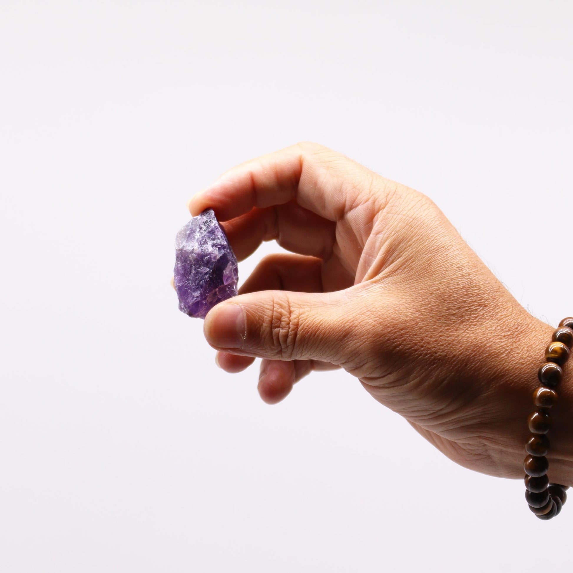 500g Raw Crystals - Amethyst product packaging on clean background from Quintessential Holistic Health Ltd