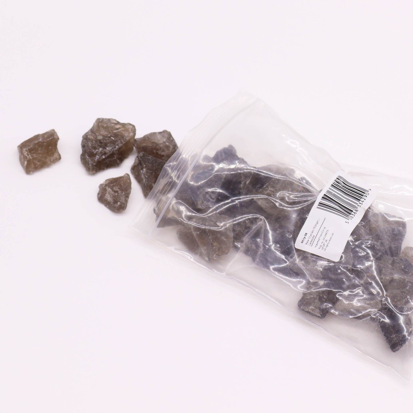 500g Raw Crystals - Smoky Quartz product packaging on clean background from Quintessential Holistic Health Ltd