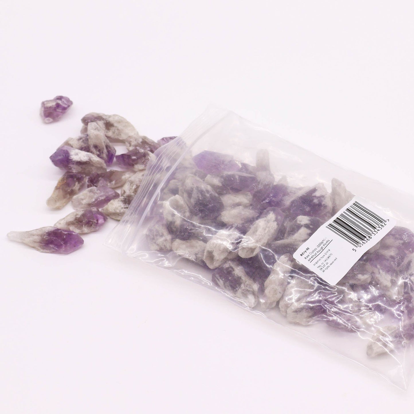 500g Raw Crystals - Amethyst Rough Points product packaging on clean background from Quintessential Holistic Health Ltd