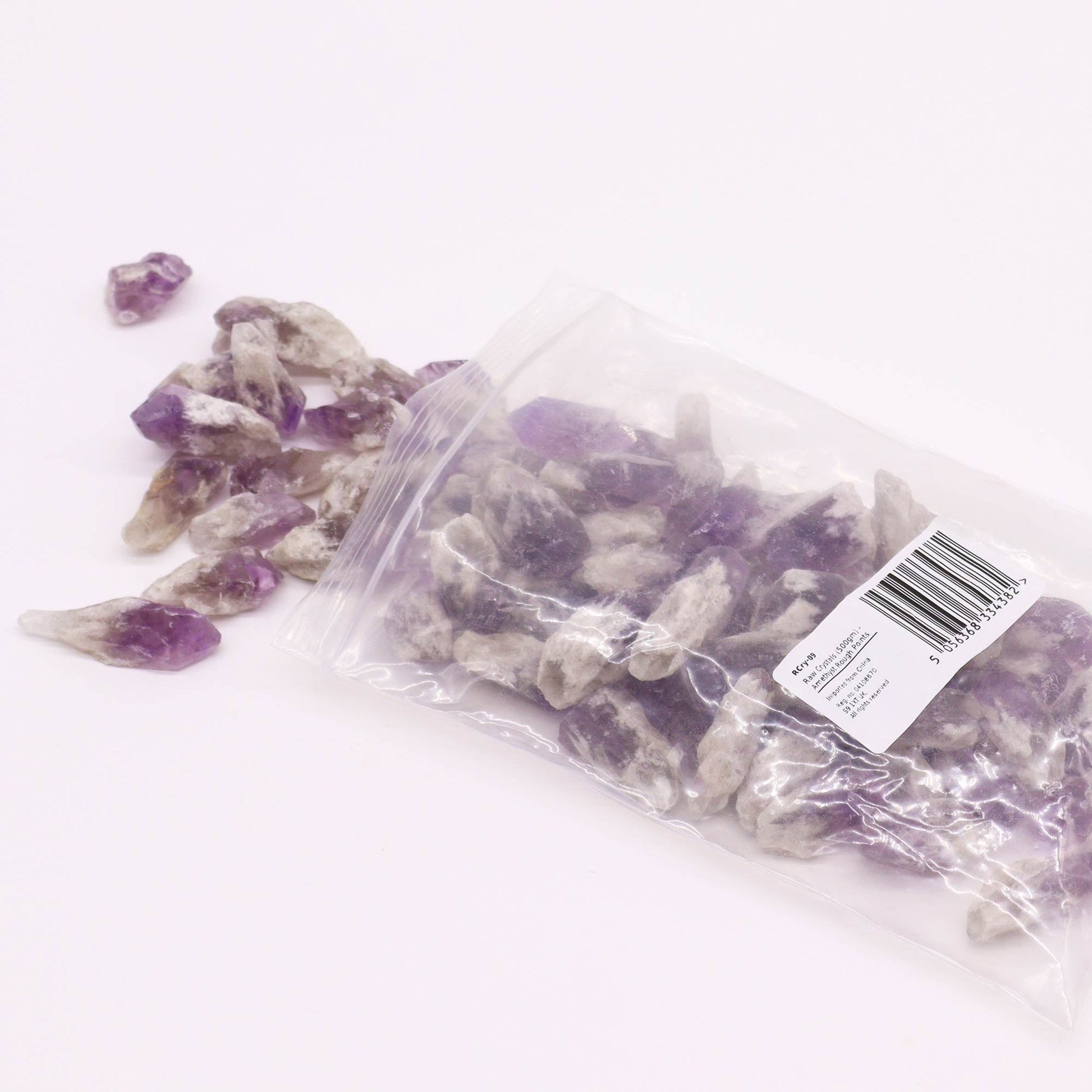 500g Raw Crystals - Amethyst Rough Points product packaging on clean background from Quintessential Holistic Health Ltd