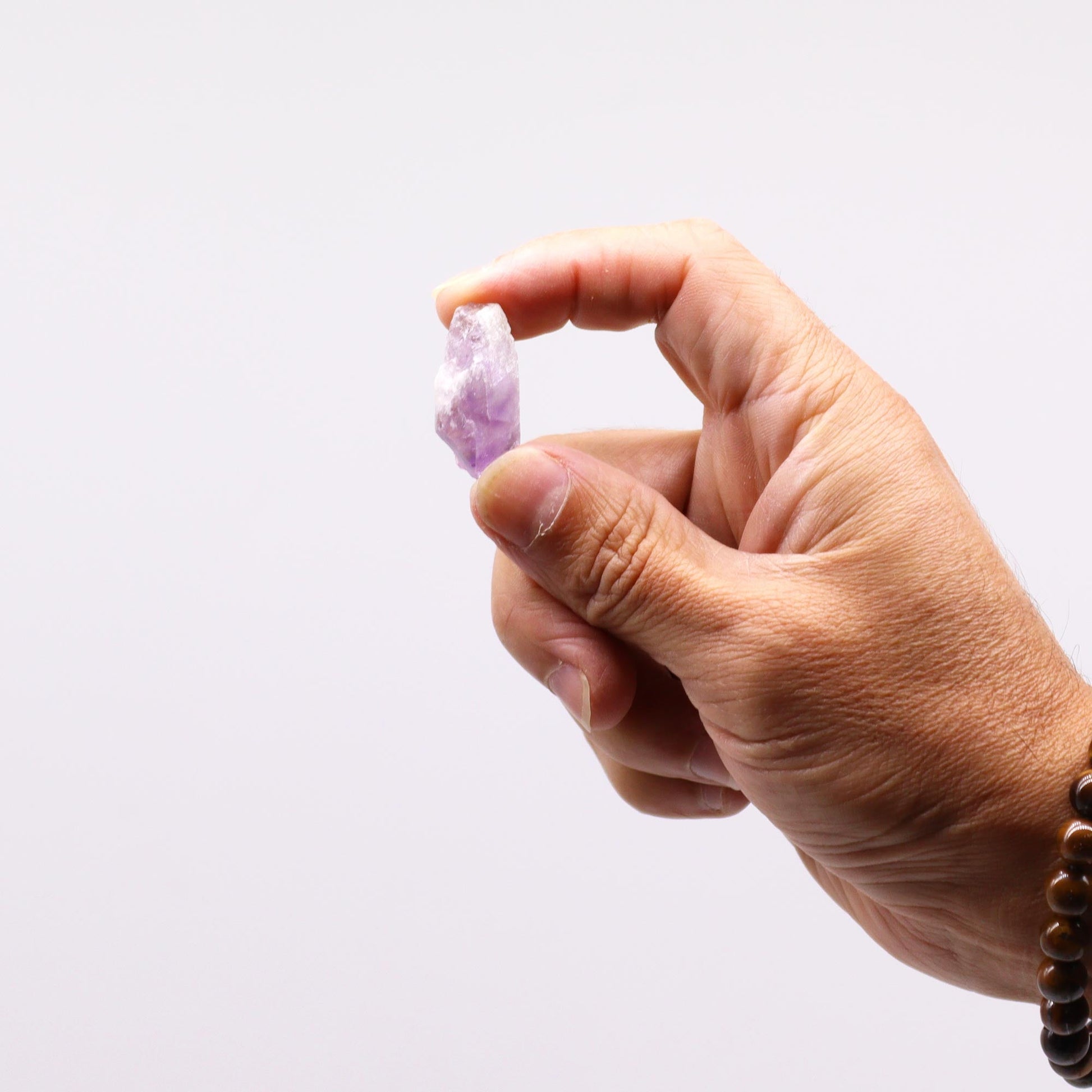 500g Raw Crystals - Amethyst Rough Points product packaging on clean background from Quintessential Holistic Health Ltd
