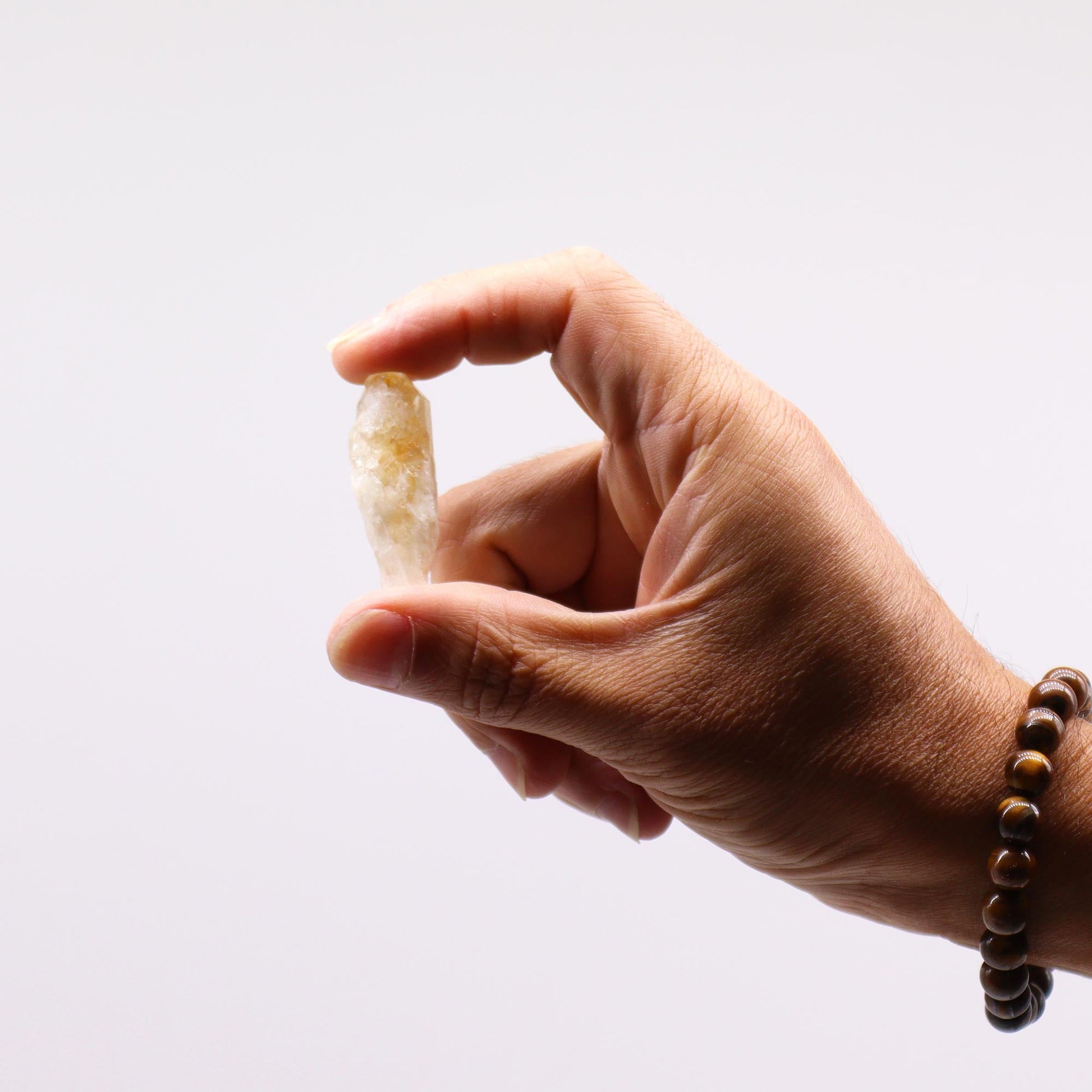 500g Raw Crystals - Citrine Rough Points product packaging on clean background from Quintessential Holistic Health Ltd