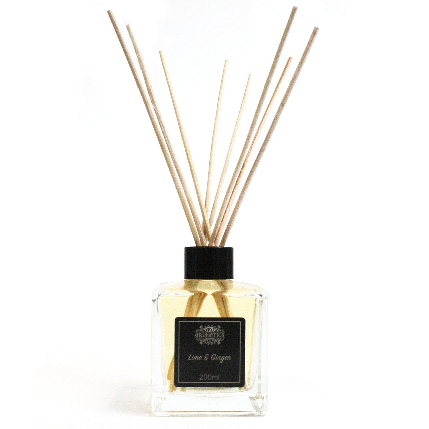 Reed Diffuser - Lime and Ginger - 200ml, clear square bottle with pale liquid, black cap and fanned reeds by Quintessential Holistic Health Ltd
