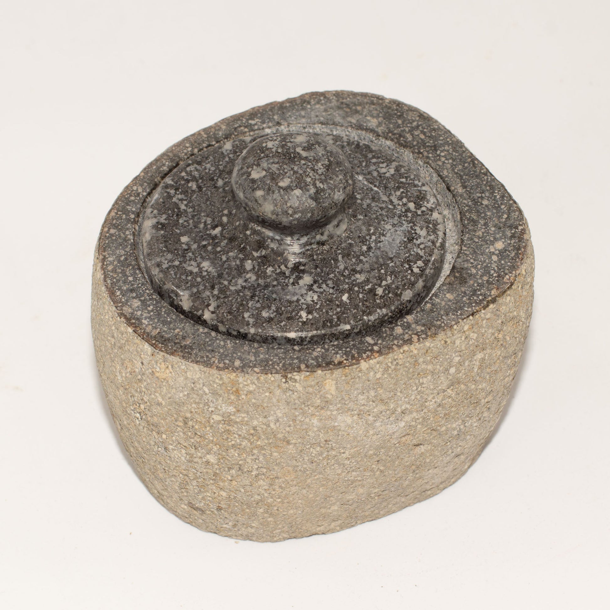 Hand Carved Natural River Stone Grounding Pot - Small product packaging on clean background from Quintessential Holistic Health Ltd