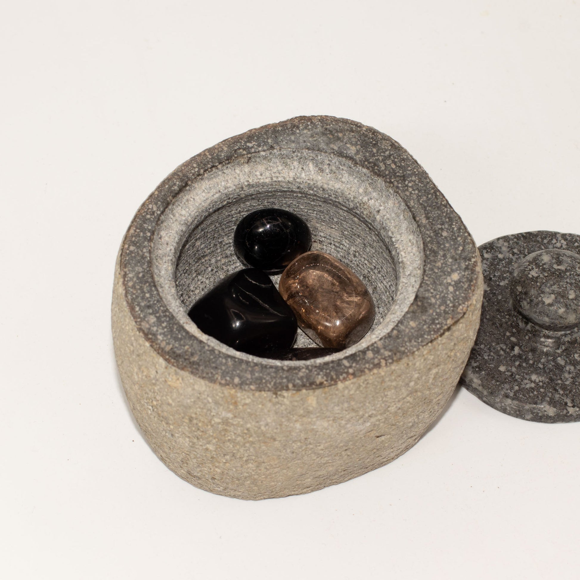 Hand Carved Natural River Stone Grounding Pot - Small product packaging on clean background from Quintessential Holistic Health Ltd