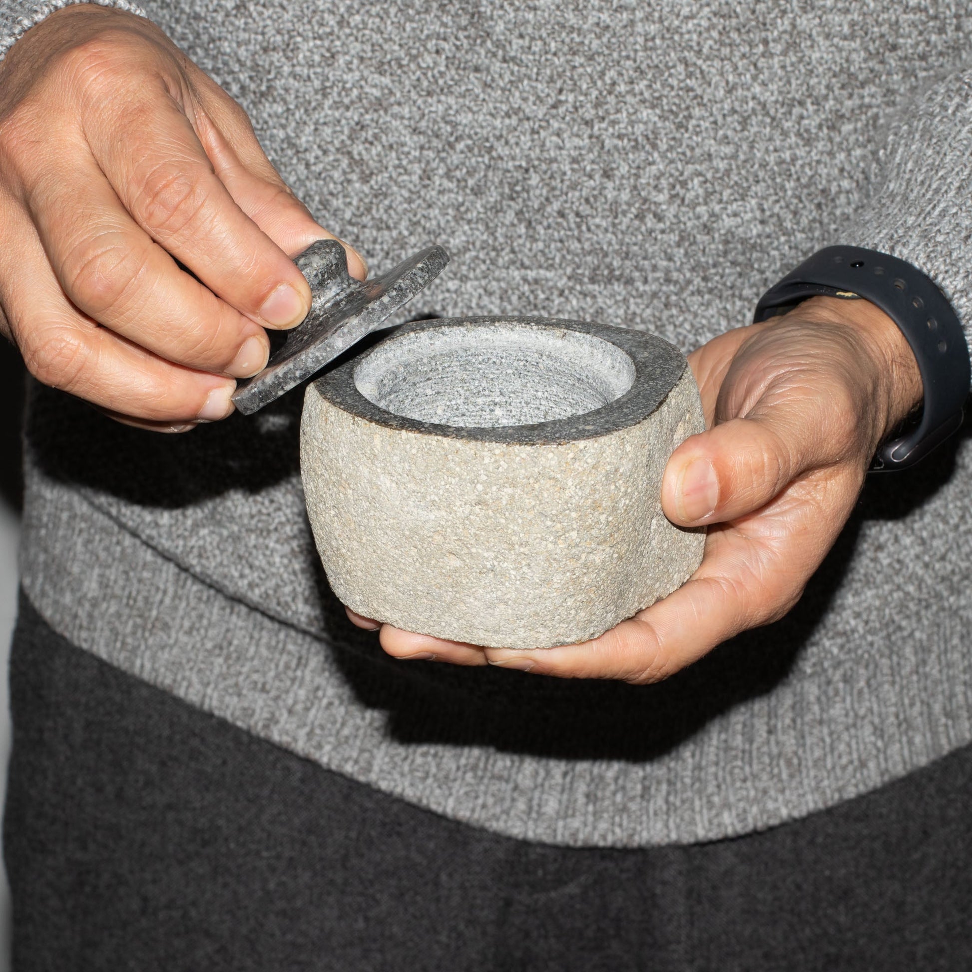 Hand Carved Natural River Stone Grounding Pot - Small product packaging on clean background from Quintessential Holistic Health Ltd
