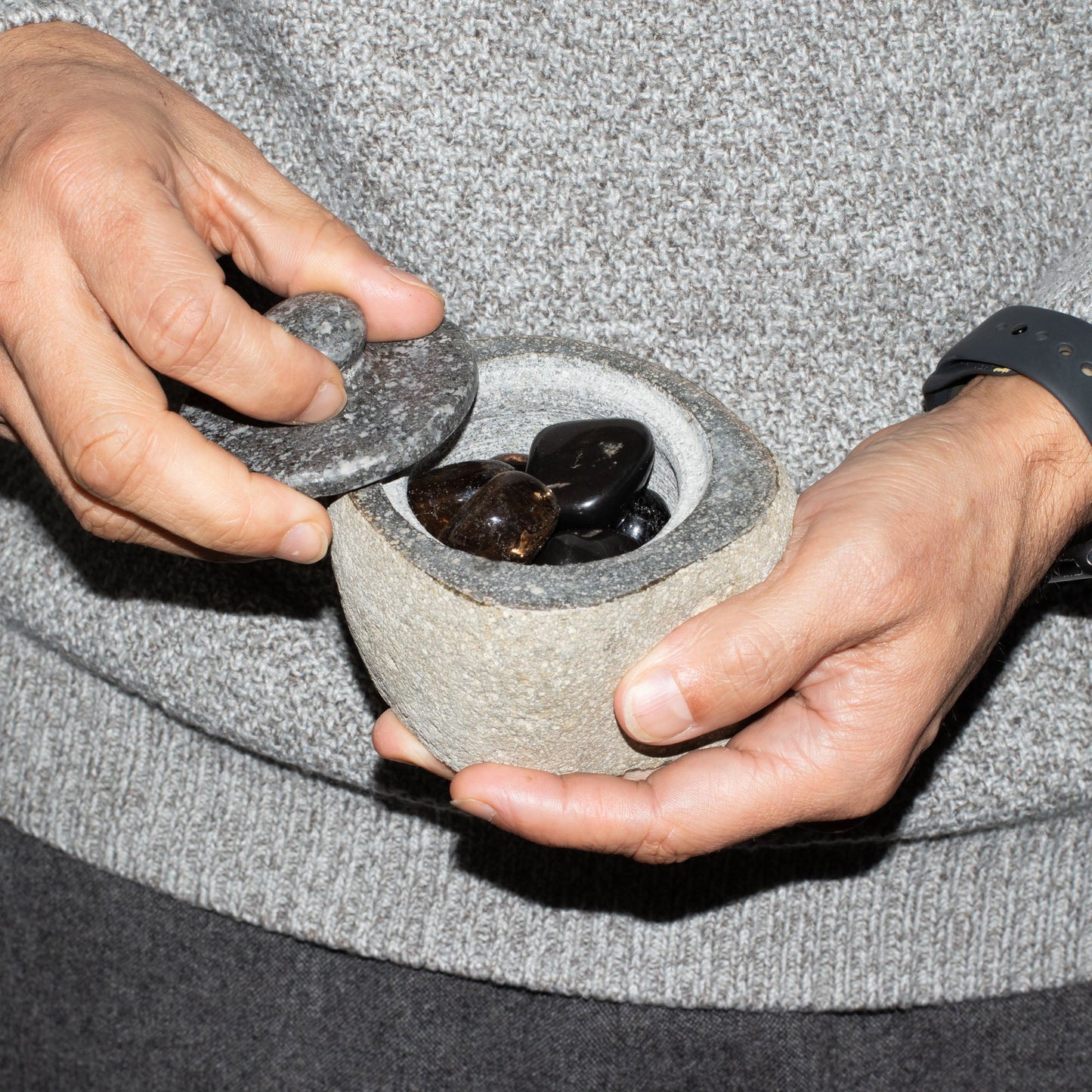 Hand Carved Natural River Stone Grounding Pot - Small product packaging on clean background from Quintessential Holistic Health Ltd