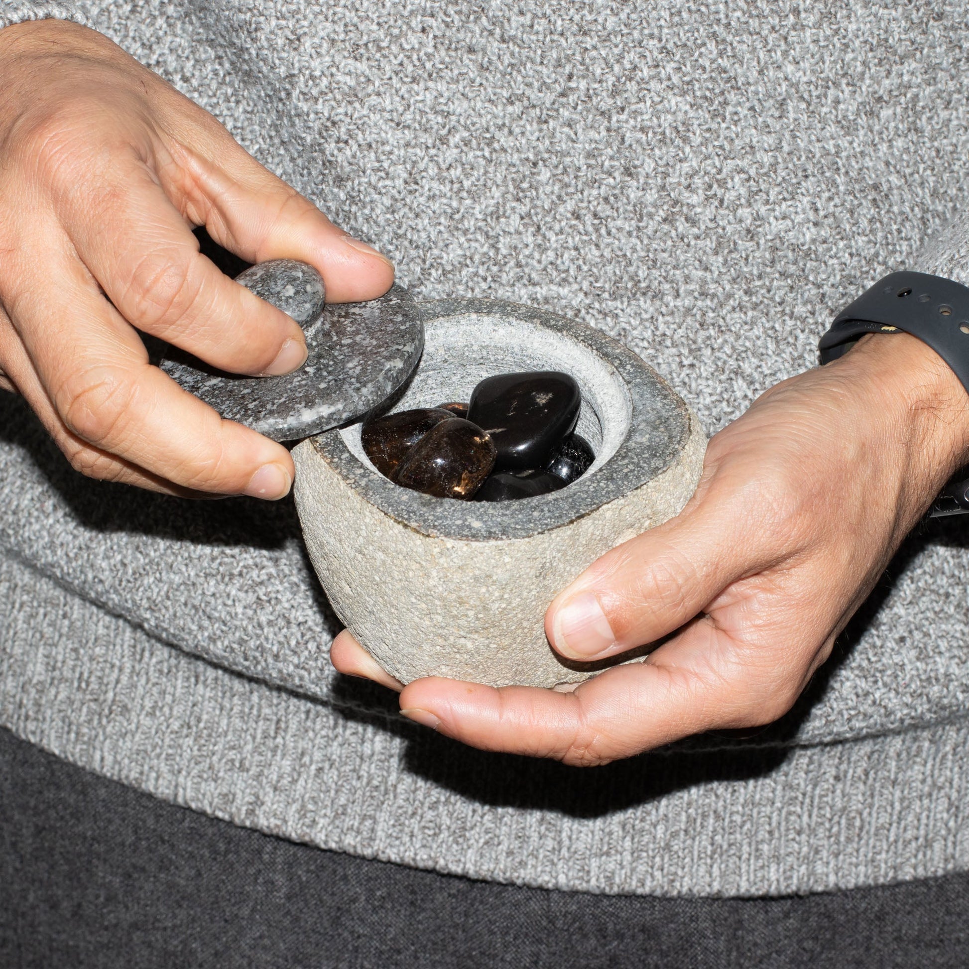 Hand Carved Natural River Stone Grounding Pot - Small product packaging on clean background from Quintessential Holistic Health Ltd