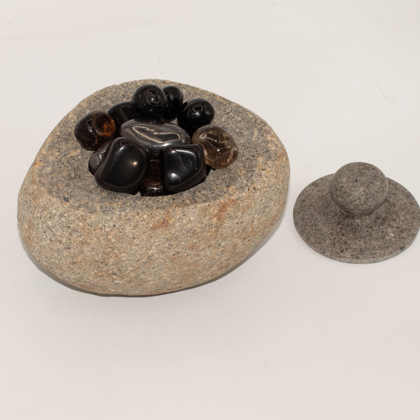 Hand Carved Natural River Stone Grounding Pot - Large product packaging on clean background from Quintessential Holistic Health Ltd