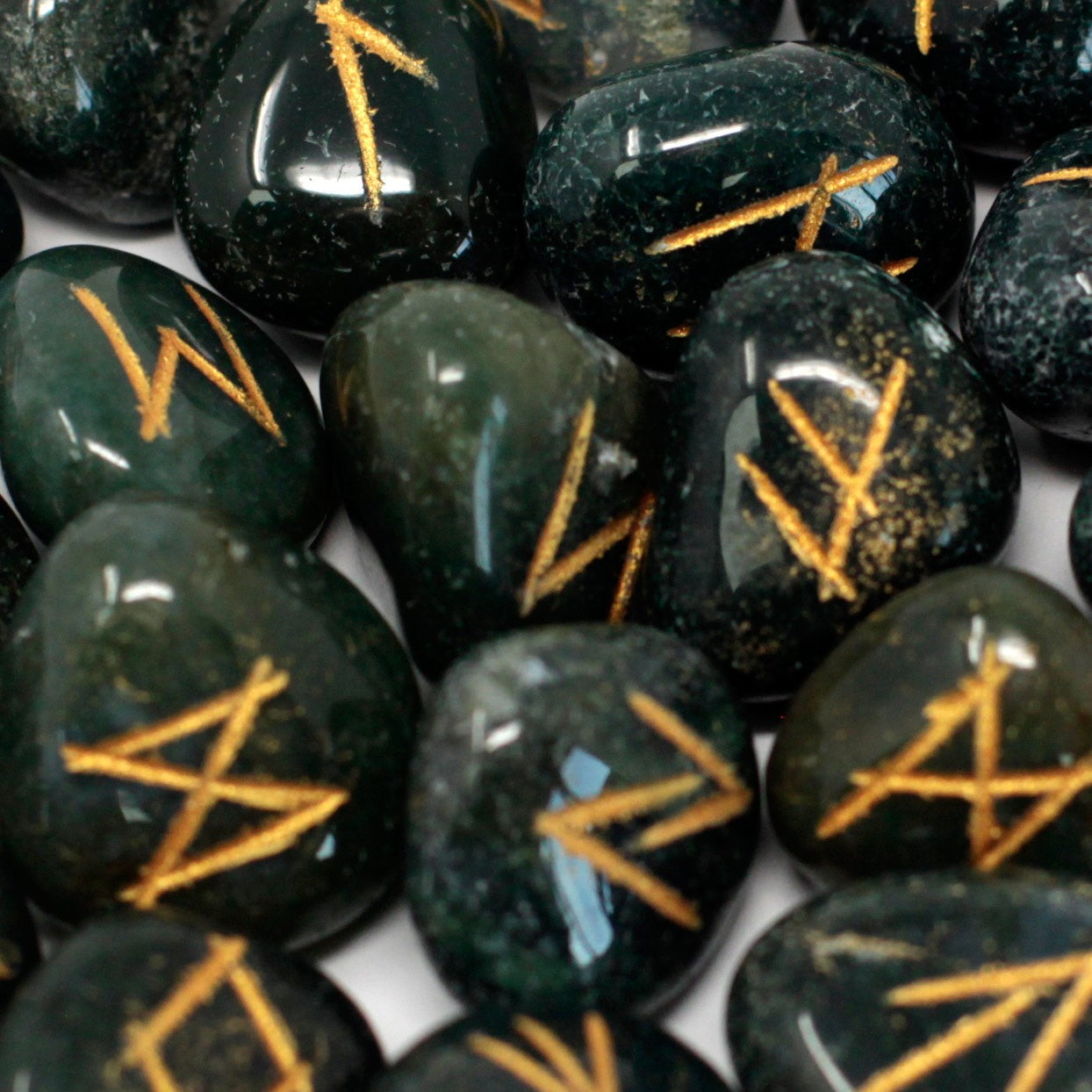 Rune Stone Set in a Pouch - Bloodstone Gemstones product packaging on clean background from Quintessential Holistic Health Ltd