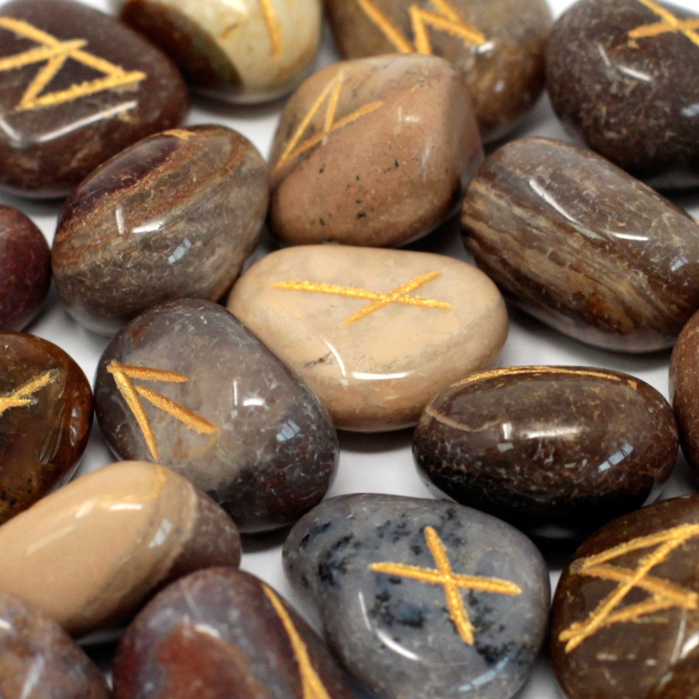 Rune Stone Set in a Pouch - Fancy Jasper Gemstones product packaging on clean background from Quintessential Holistic Health Ltd