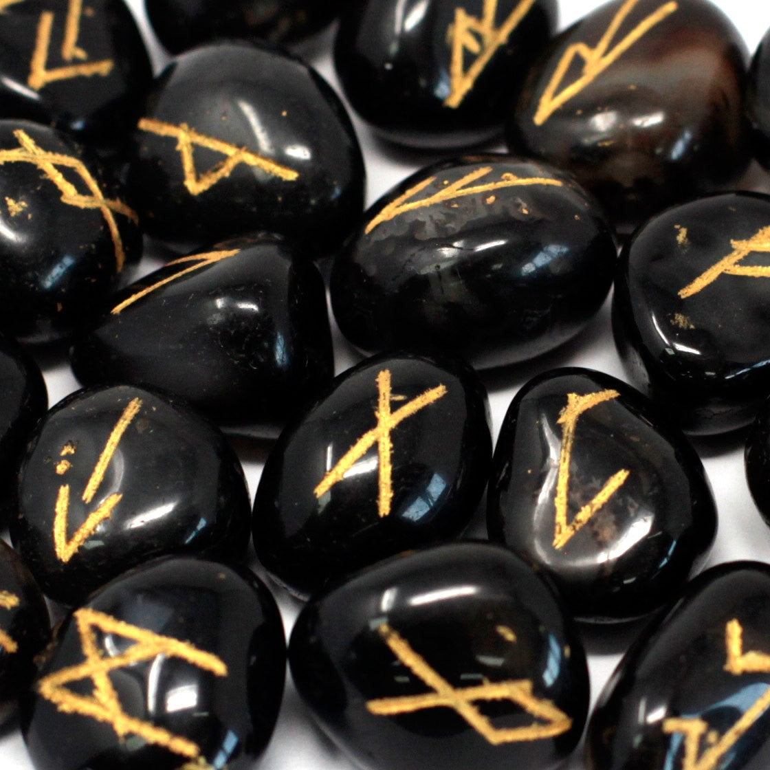 Rune Stone Set in a Pouch - Black Onyx Gemstones product packaging on clean background from Quintessential Holistic Health Ltd