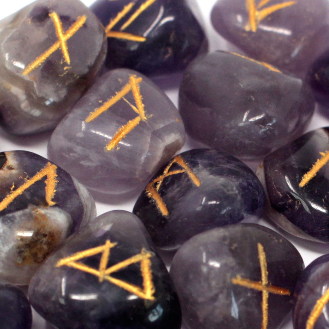 Rune Stone Set in a Pouch - Amethyst Gemstones product packaging on clean background from Quintessential Holistic Health Ltd