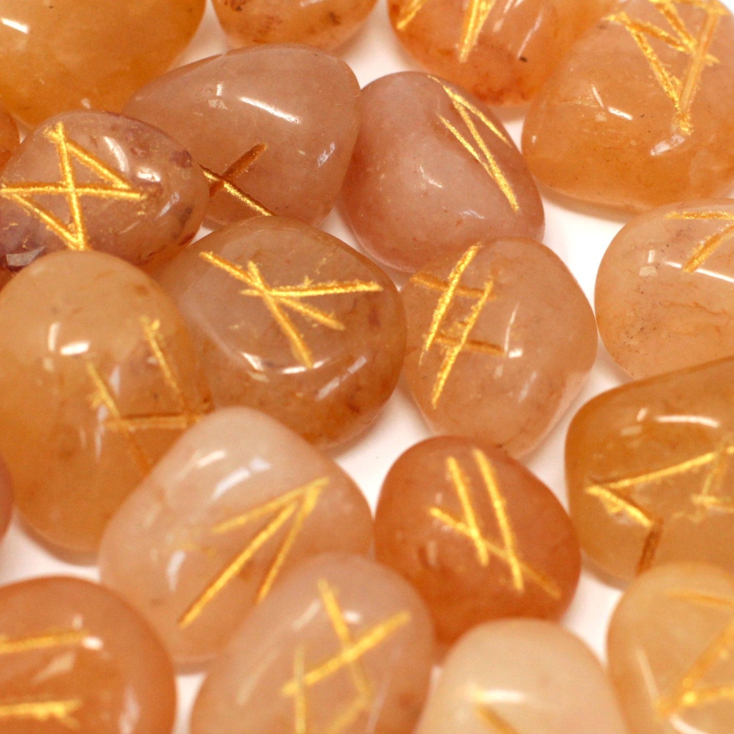 Rune Stone Set in a Pouch - Yellow Aventurine Gemstones product packaging on clean background from Quintessential Holistic Health Ltd