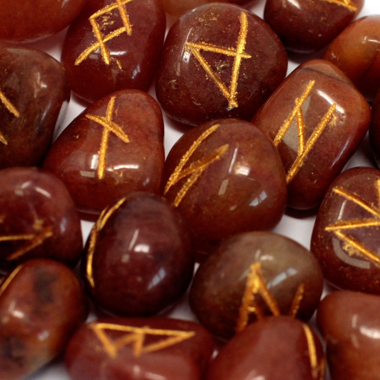 Rune Stone Set in a Pouch - Red Aventurine Gemstones product packaging on clean background from Quintessential Holistic Health Ltd
