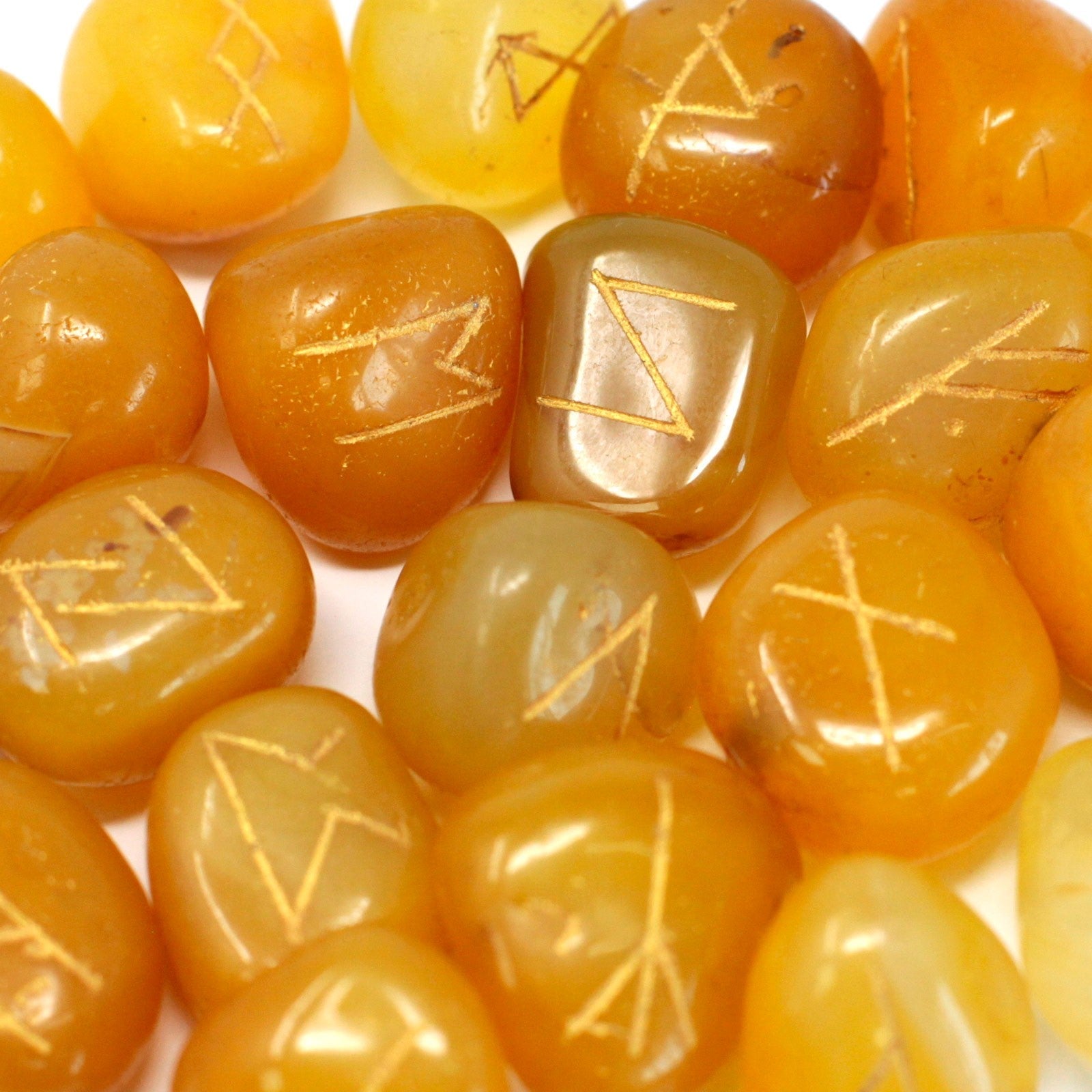 Rune Stone Set in a Pouch - Yellow Onyx Gemstones product packaging on clean background from Quintessential Holistic Health Ltd