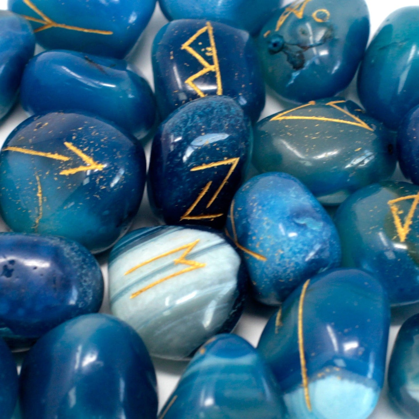 Rune Stone Set in a Pouch - Blue Onyx Gemstones product packaging on clean background from Quintessential Holistic Health Ltd
