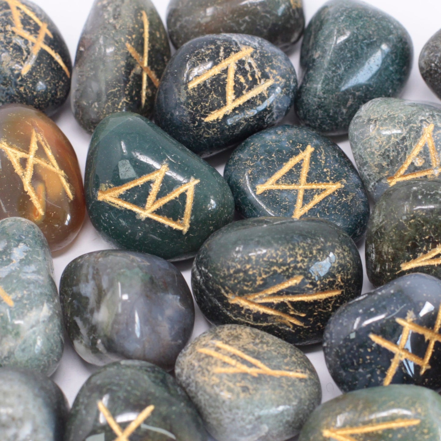 Rune Stone Set in a Pouch - Moss Agate Gemstones product packaging on clean background from Quintessential Holistic Health Ltd