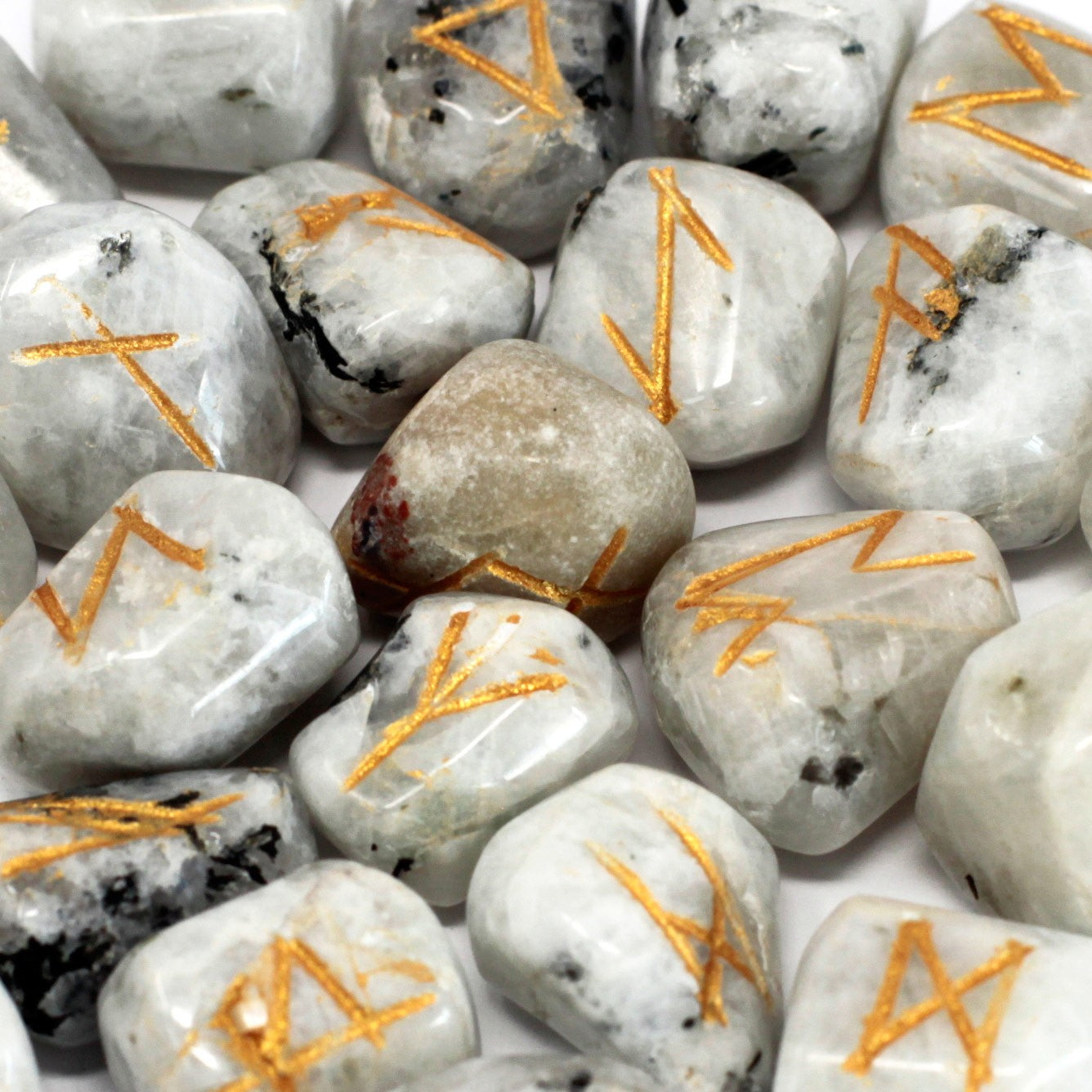 Rune Stone Set in a Pouch - Rainbow Moonstone Gemstones product packaging on clean background from Quintessential Holistic Health Ltd