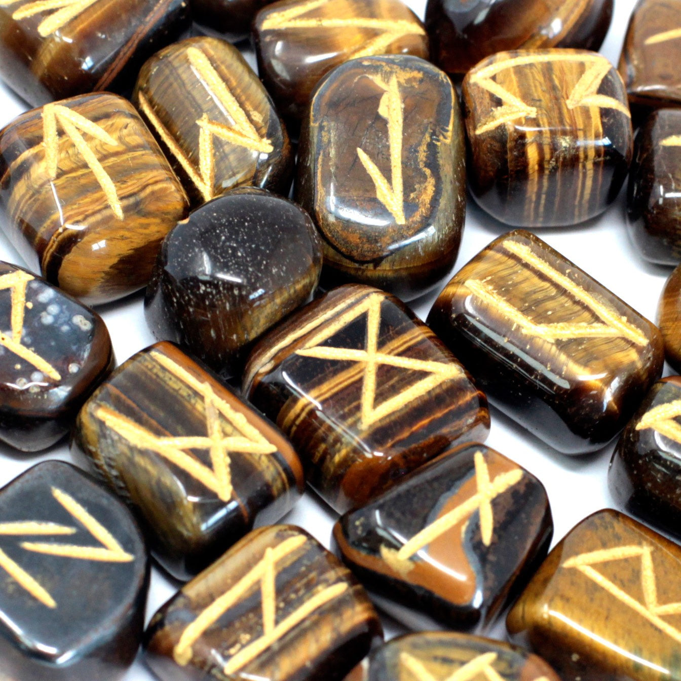 Rune Stone Set in a Pouch - Tigers Eye Gemstones product packaging on clean background from Quintessential Holistic Health Ltd