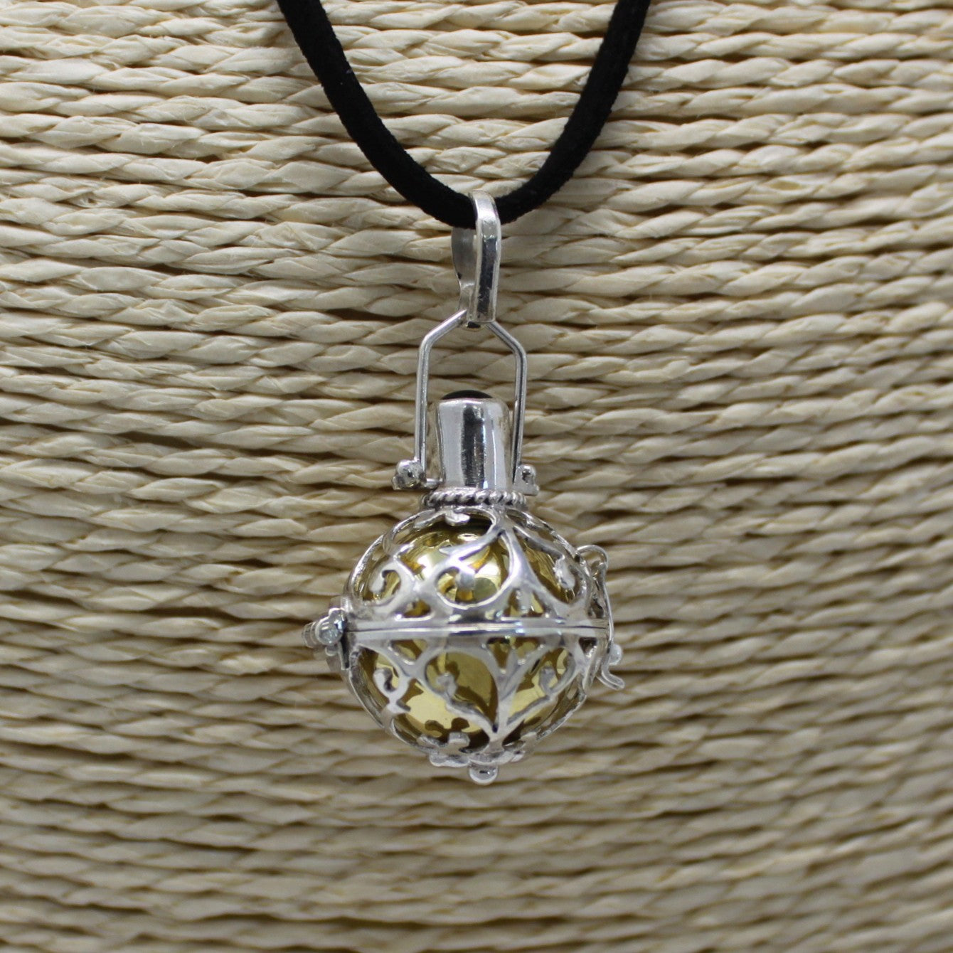 Handmade 925 Silver Angel Bell Pendant Necklace - 18mm / Night Time product packaging on clean background from Quintessential Holistic Health Ltd
