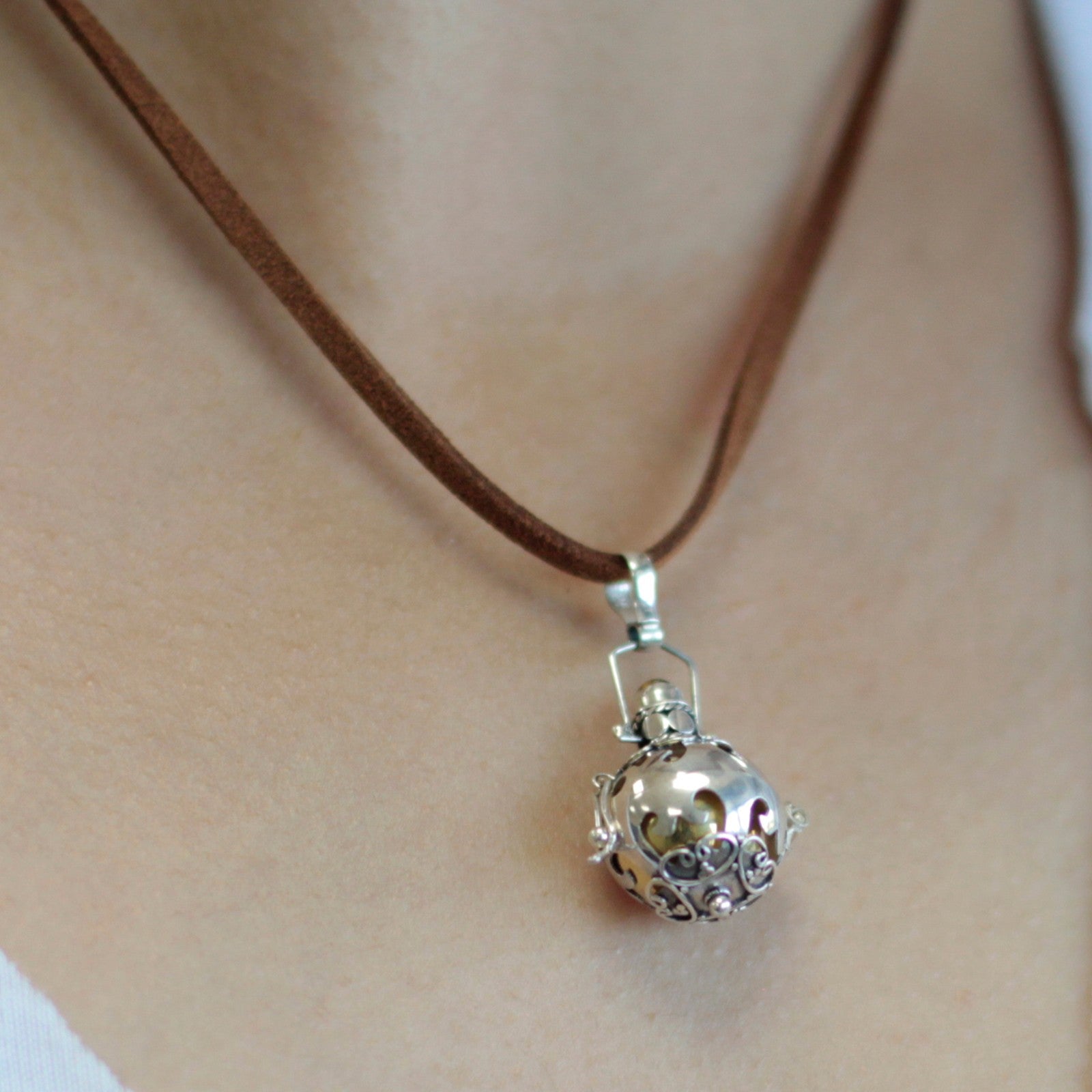 Handmade 925 Silver Angel Bell Pendant Necklace - 16mm / Protection product packaging on clean background from Quintessential Holistic Health Ltd