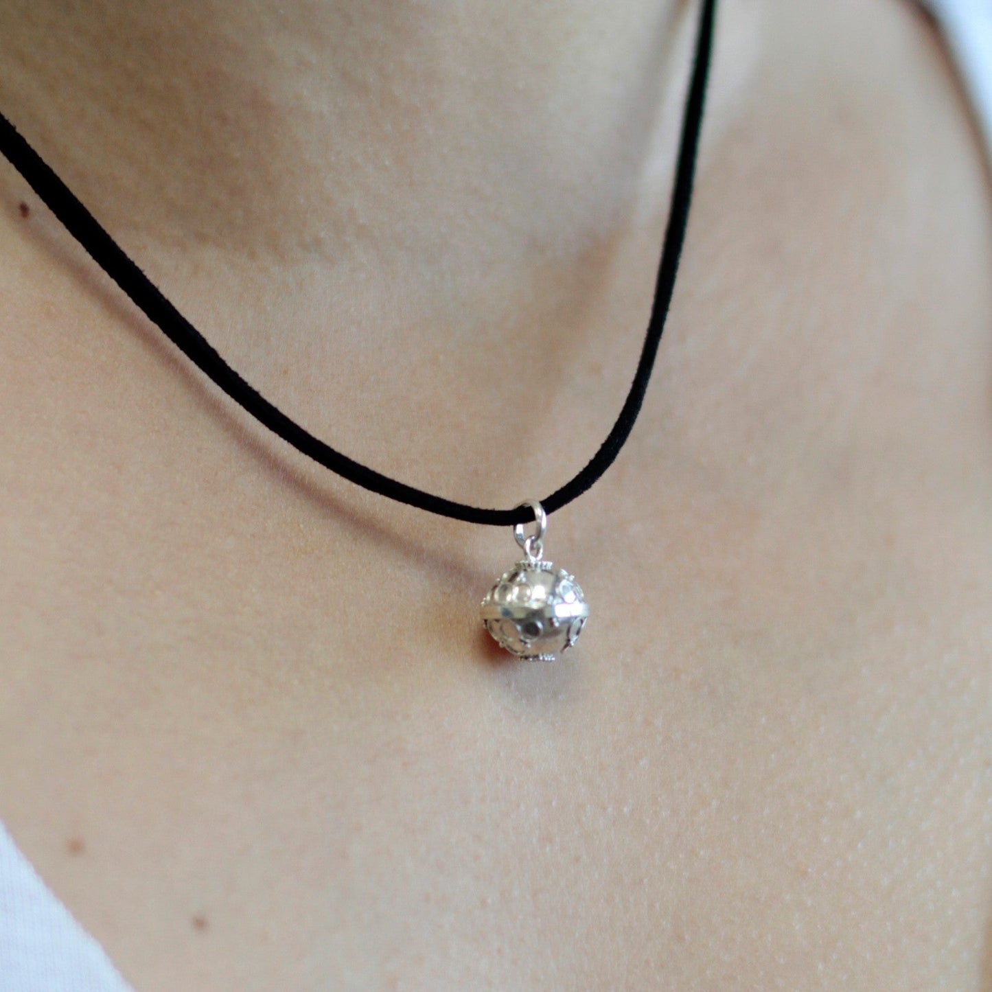 Handmade 925 Silver Angel Bell Pendant Necklace - 16mm / Prosperity product packaging on clean background from Quintessential Holistic Health Ltd