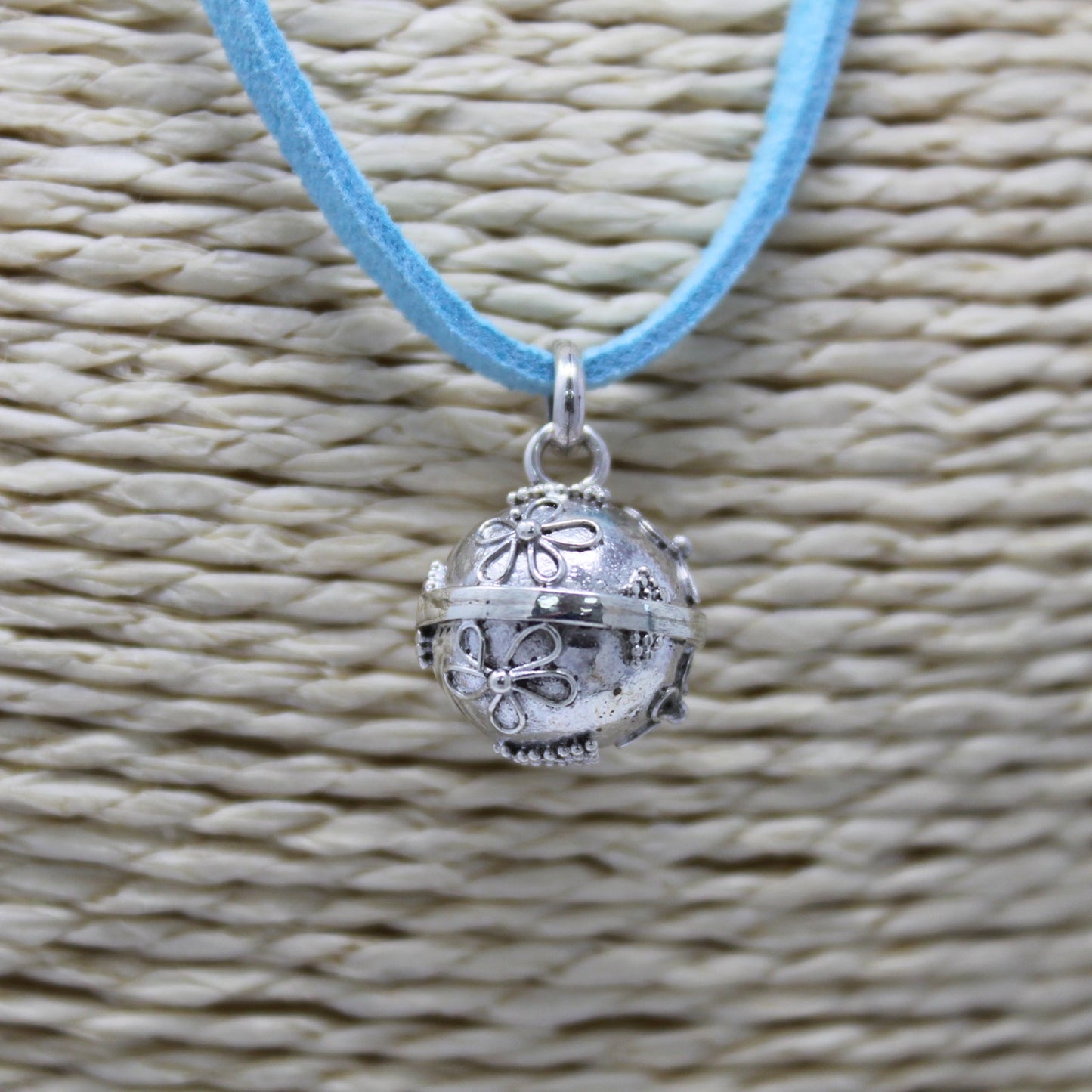 Handmade 925 Silver Angel Bell Pendant Necklace - 12mm / Grace product packaging on clean background from Quintessential Holistic Health Ltd