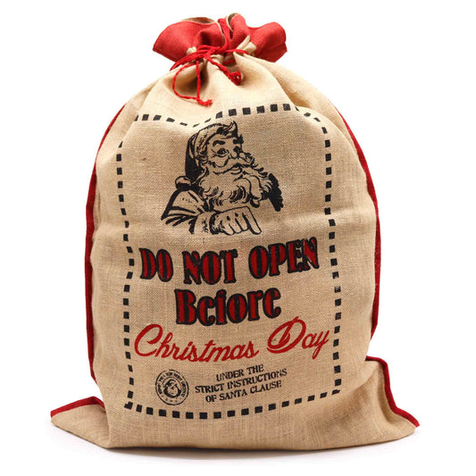 Eco-Friendly Re-Usable Jute Christmas Santa Sack - Do Not Open Before product packaging on clean background from Quintessential Holistic Health Ltd