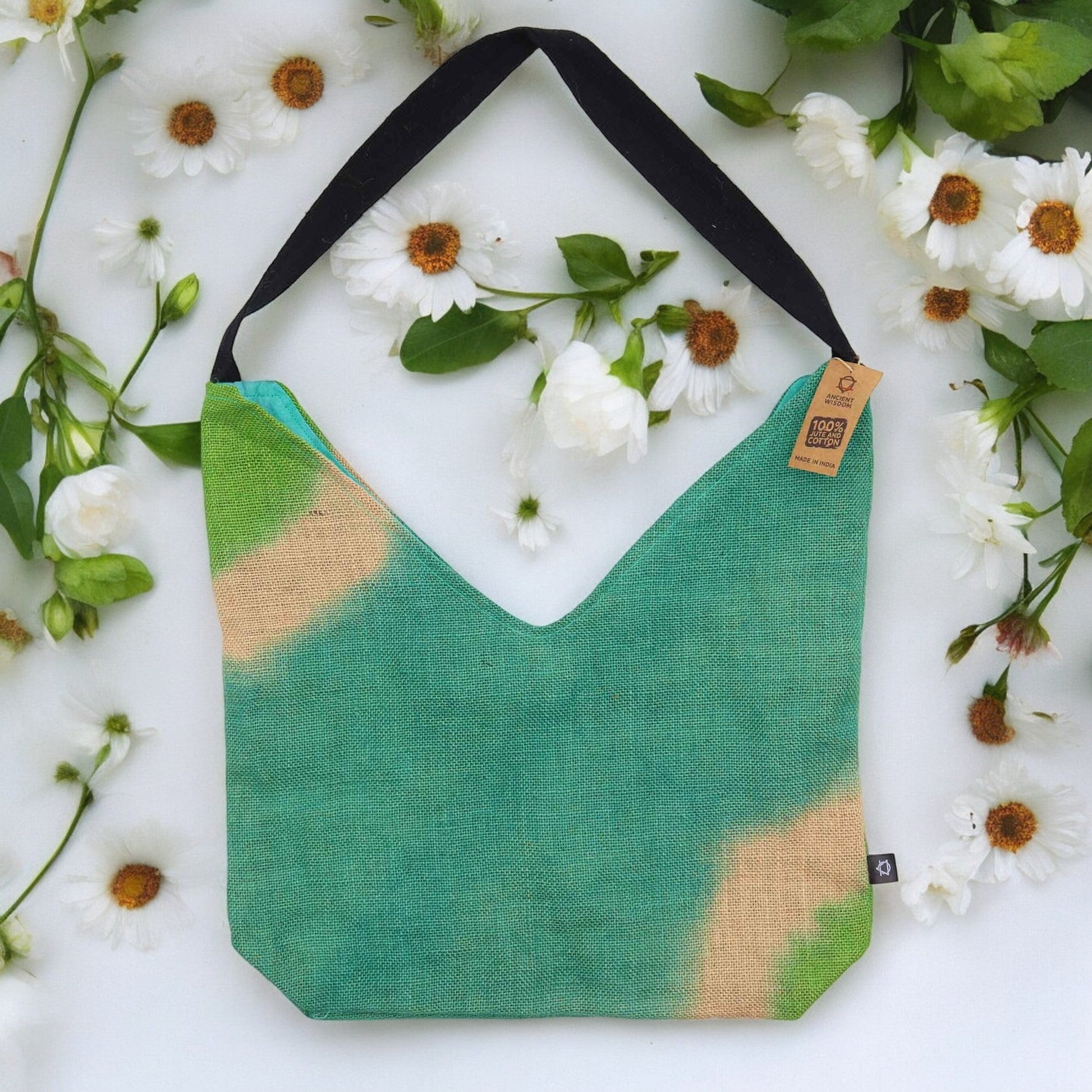 Soft Blend Eco-Friendly Jute and Cotton Shoulder Tote Bag - Teal laid flat with its wide black strap visible by Quintessential Holistic Health Ltd