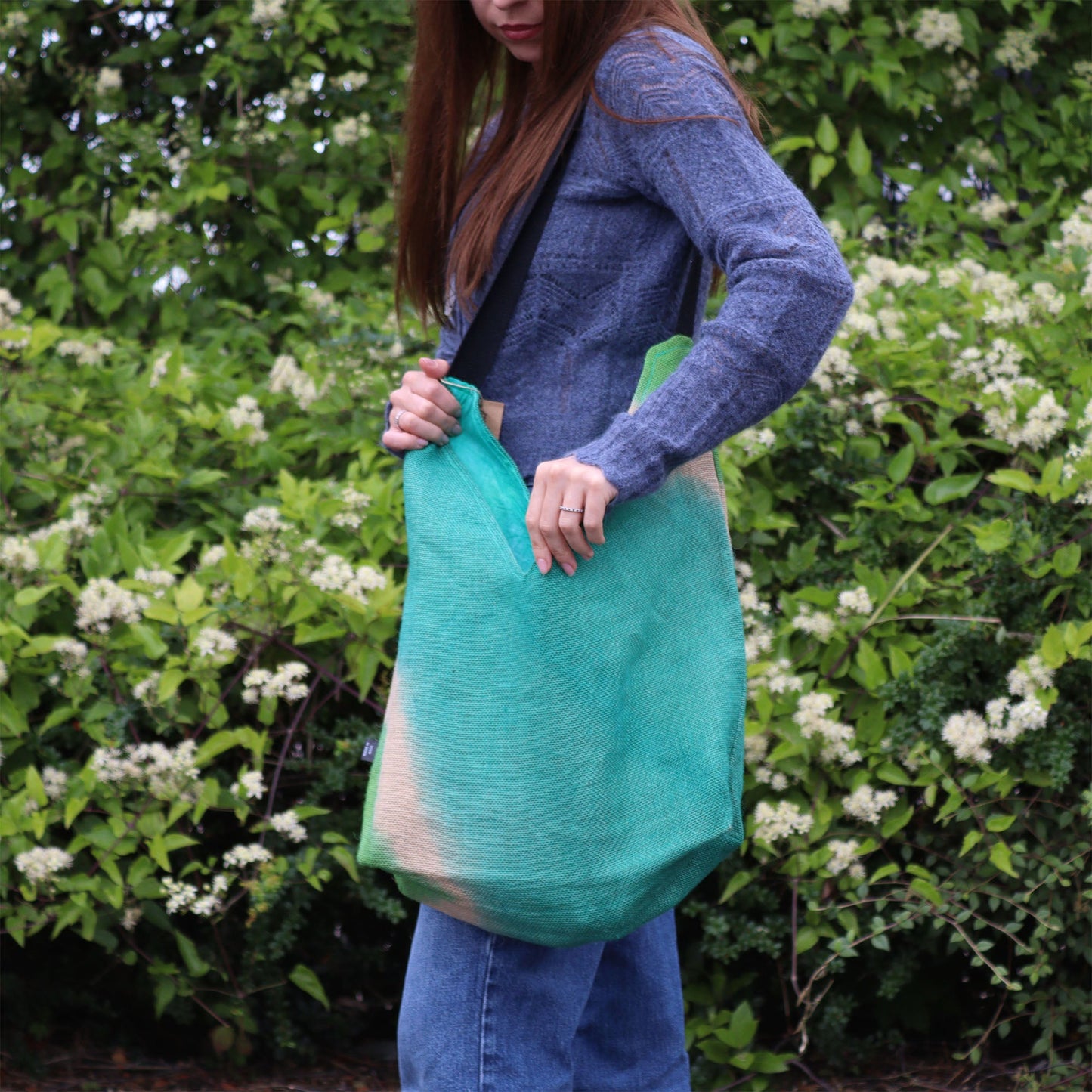Soft Blend Eco-Friendly Jute and Cotton Shoulder Tote Bag - Teal worn over the shoulder at hip length by Quintessential Holistic Health Ltd