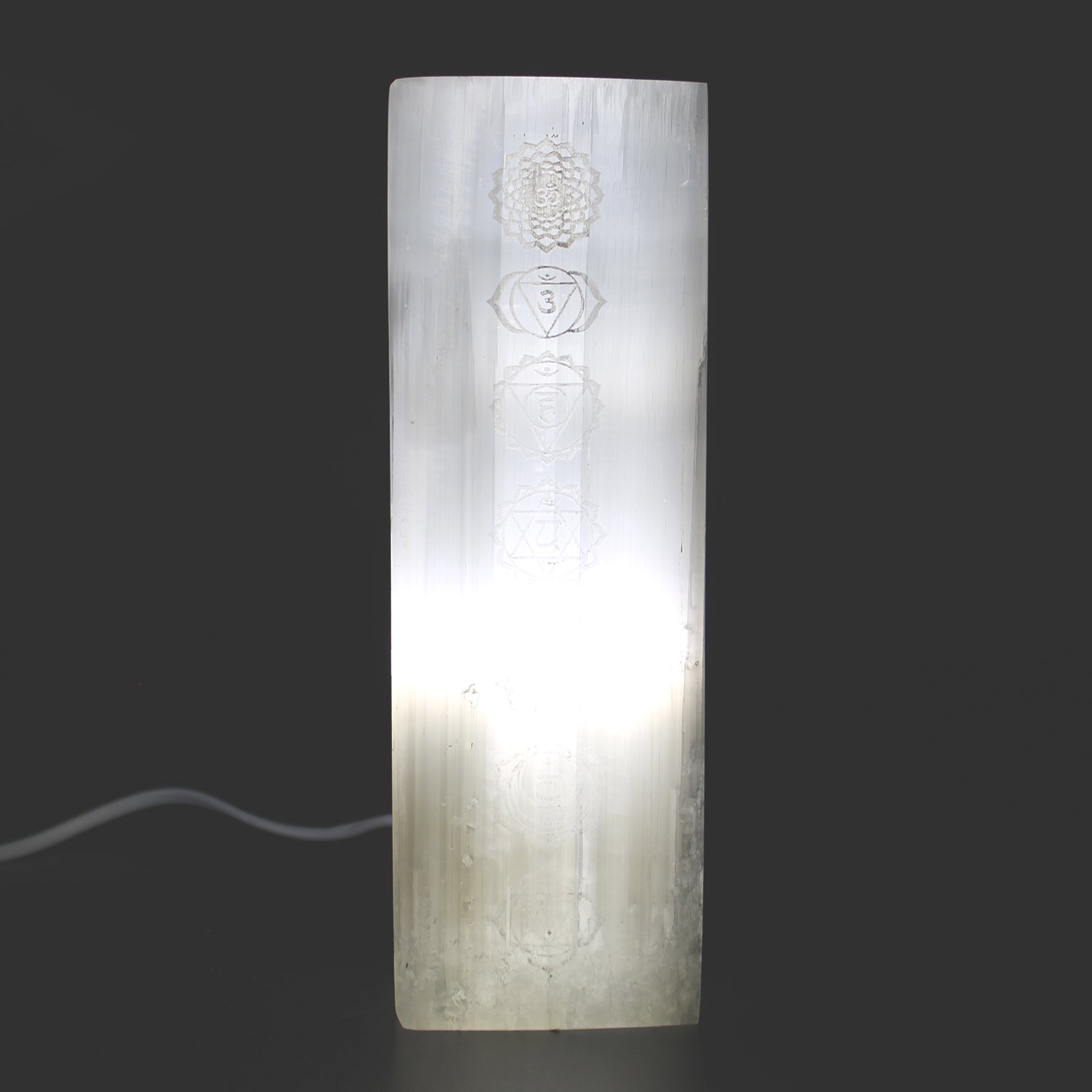Handmade Selenite Block Lamp - Seven Chakra product packaging on clean background from Quintessential Holistic Health Ltd