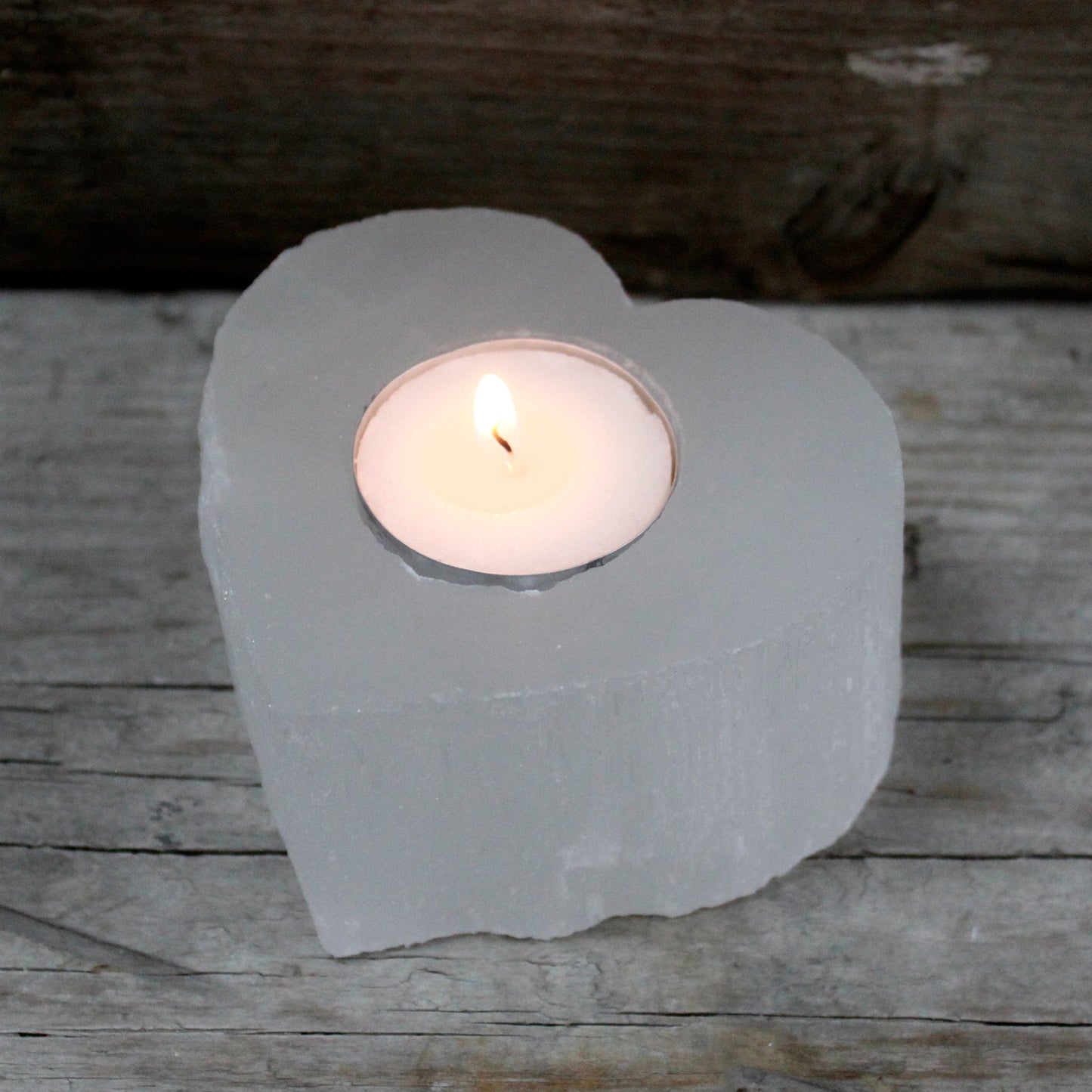 Selenite Heart Candle Holder product packaging on clean background from Quintessential Holistic Health Ltd