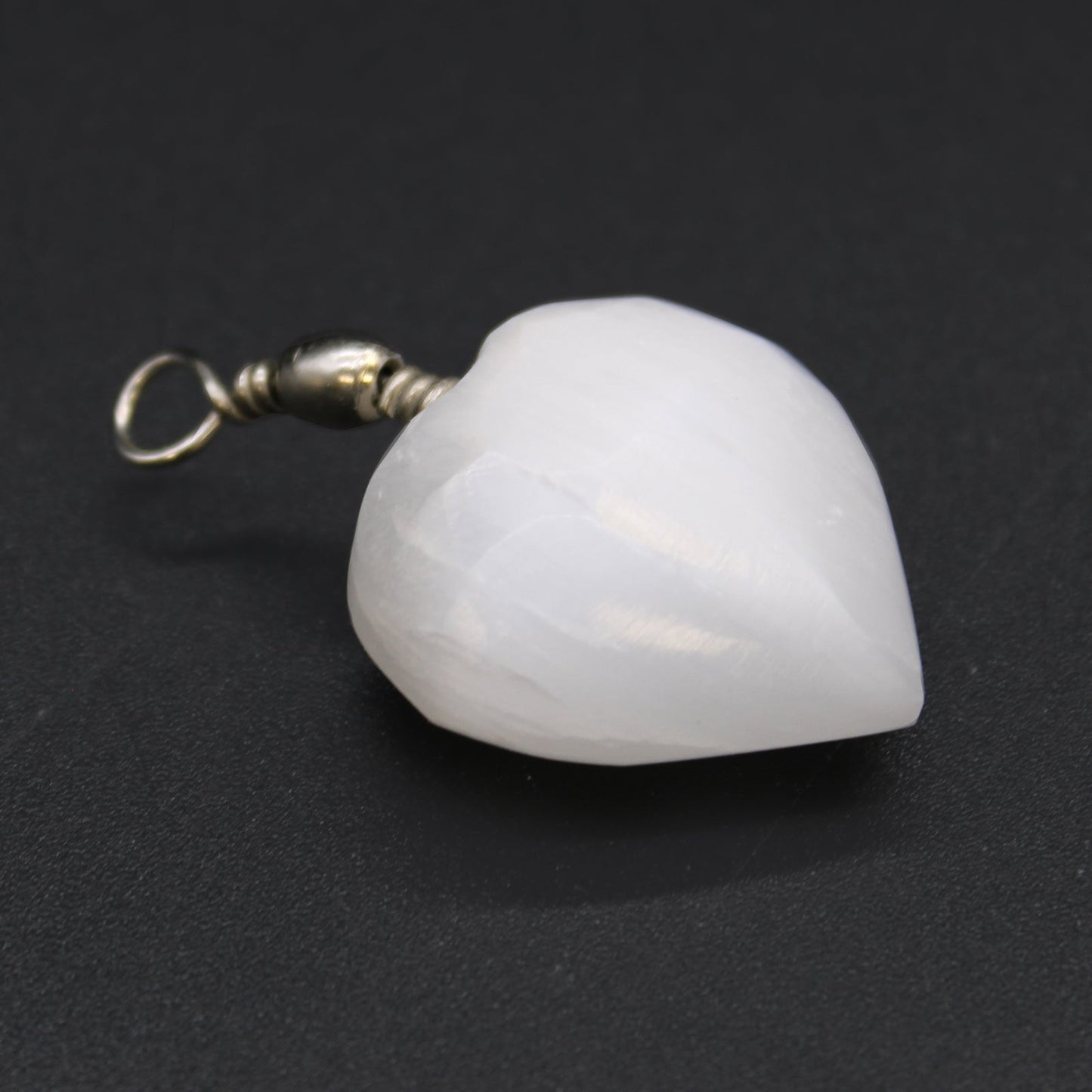 Selenite Heart Pendant product packaging on clean background from Quintessential Holistic Health Ltd