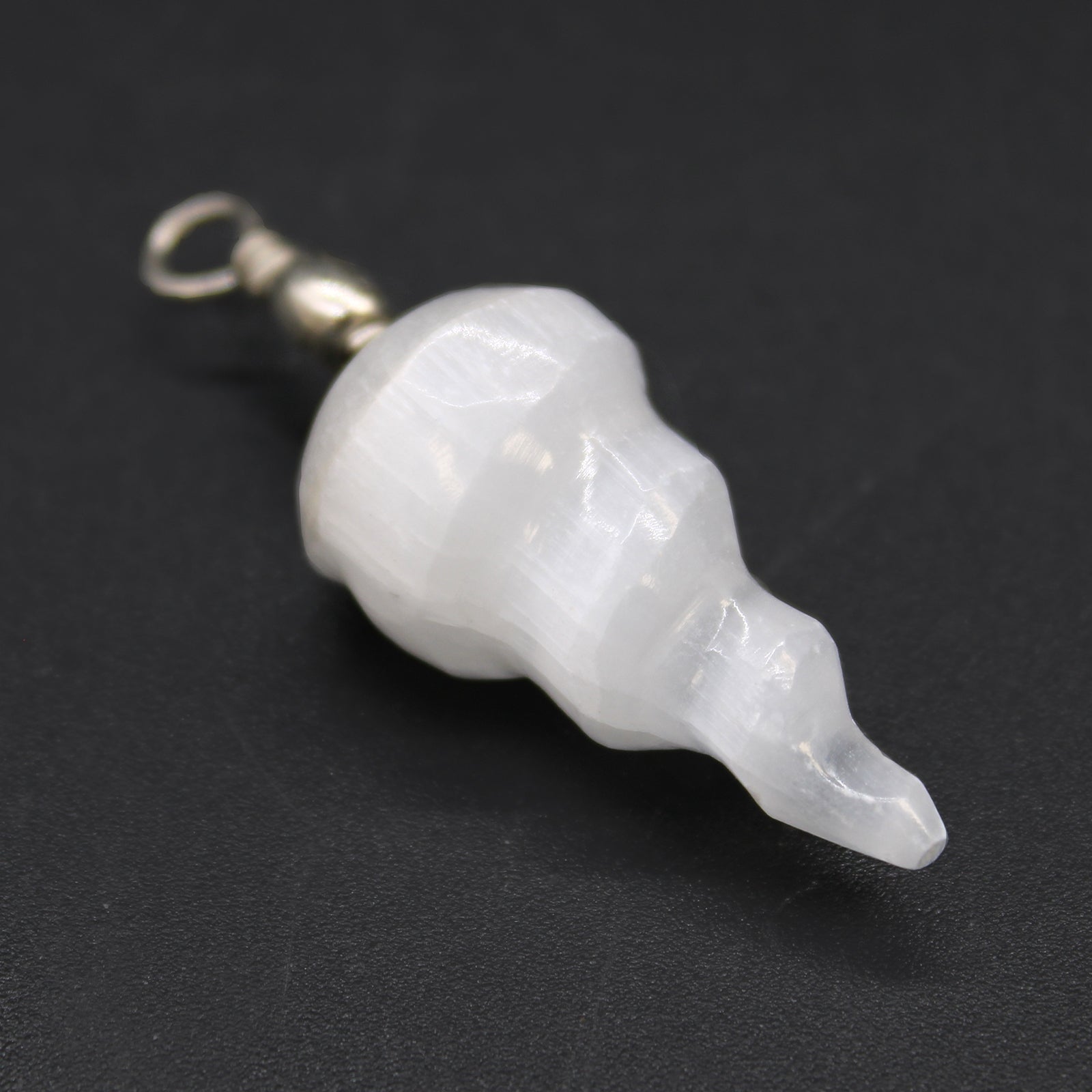 Selenite Spiral Pendant product packaging on clean background from Quintessential Holistic Health Ltd