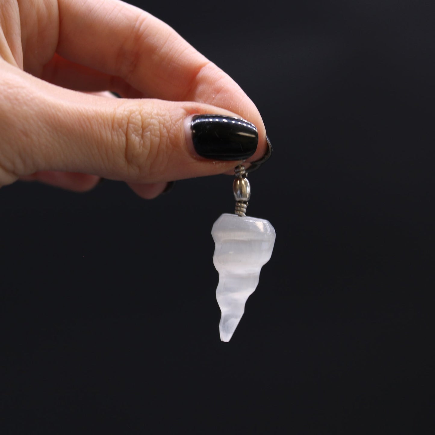 Selenite Spiral Pendant product packaging on clean background from Quintessential Holistic Health Ltd
