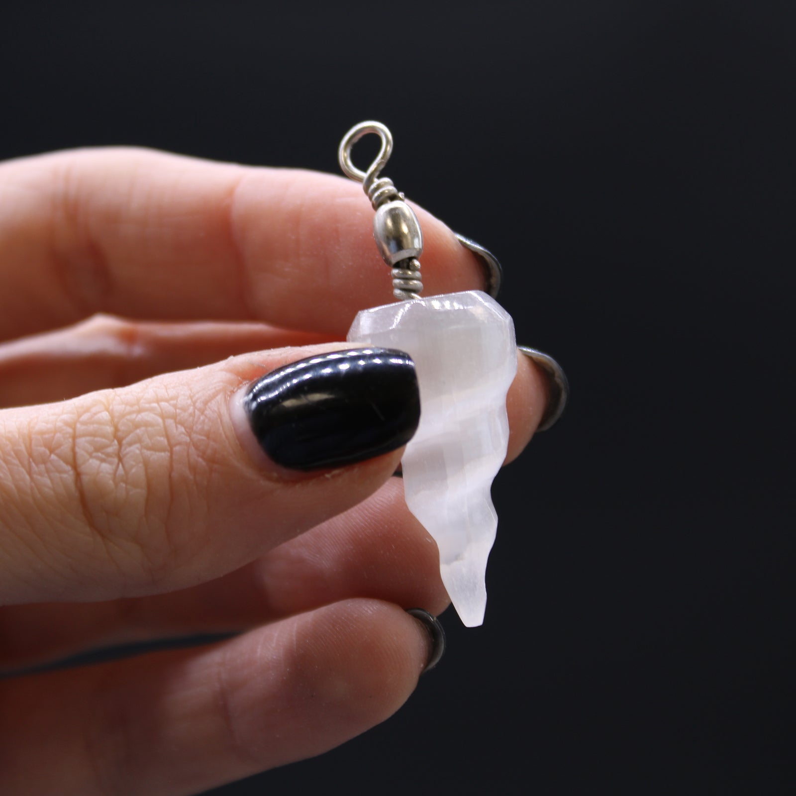 Selenite Spiral Pendant product packaging on clean background from Quintessential Holistic Health Ltd