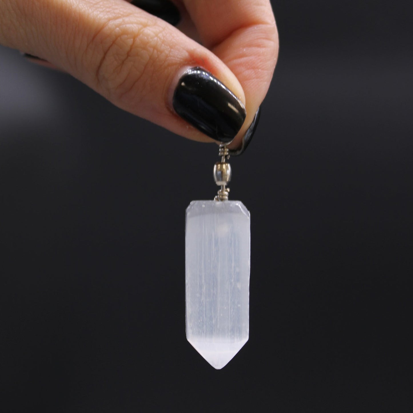 Selenite Obelisk Pendant product packaging on clean background from Quintessential Holistic Health Ltd