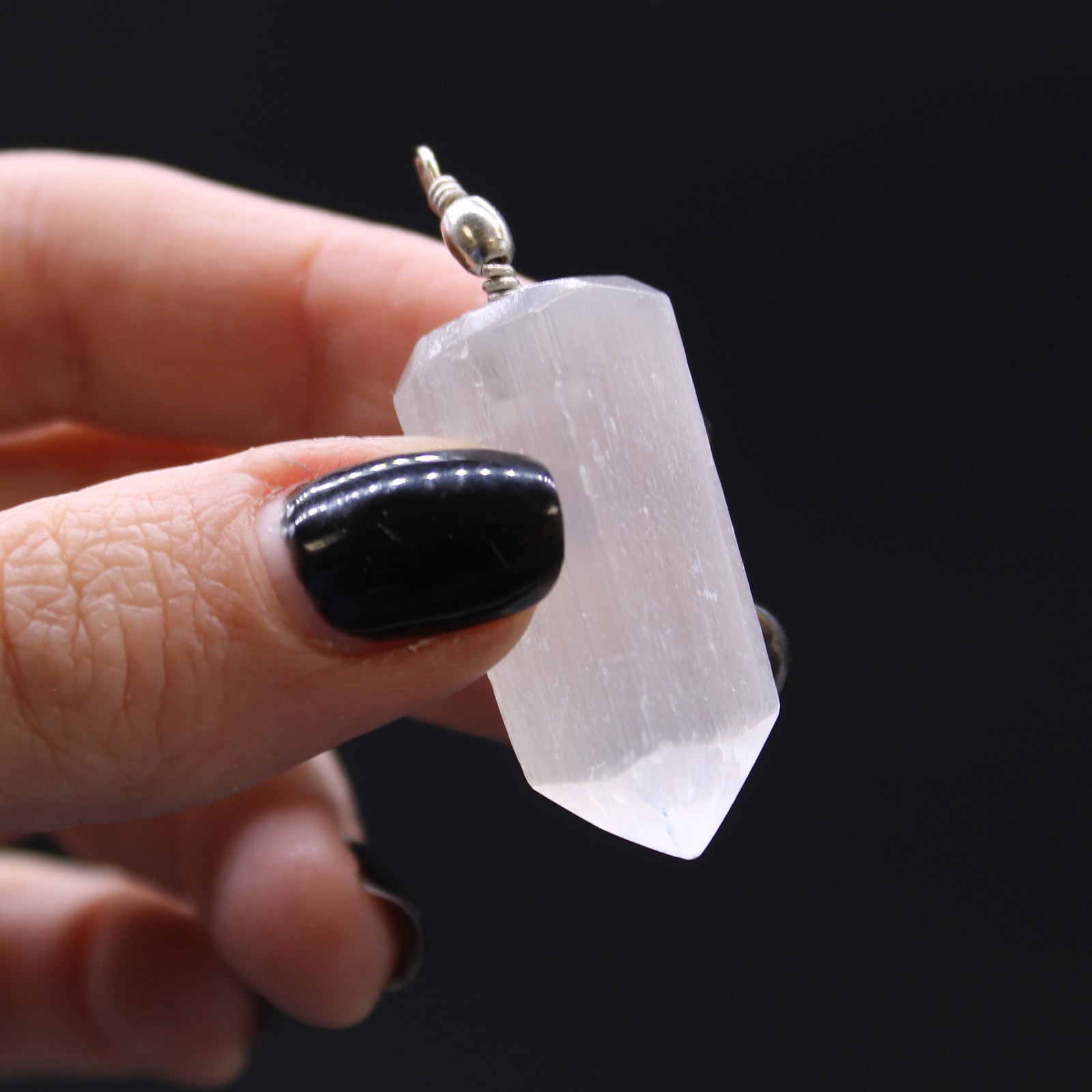 Selenite Obelisk Pendant product packaging on clean background from Quintessential Holistic Health Ltd
