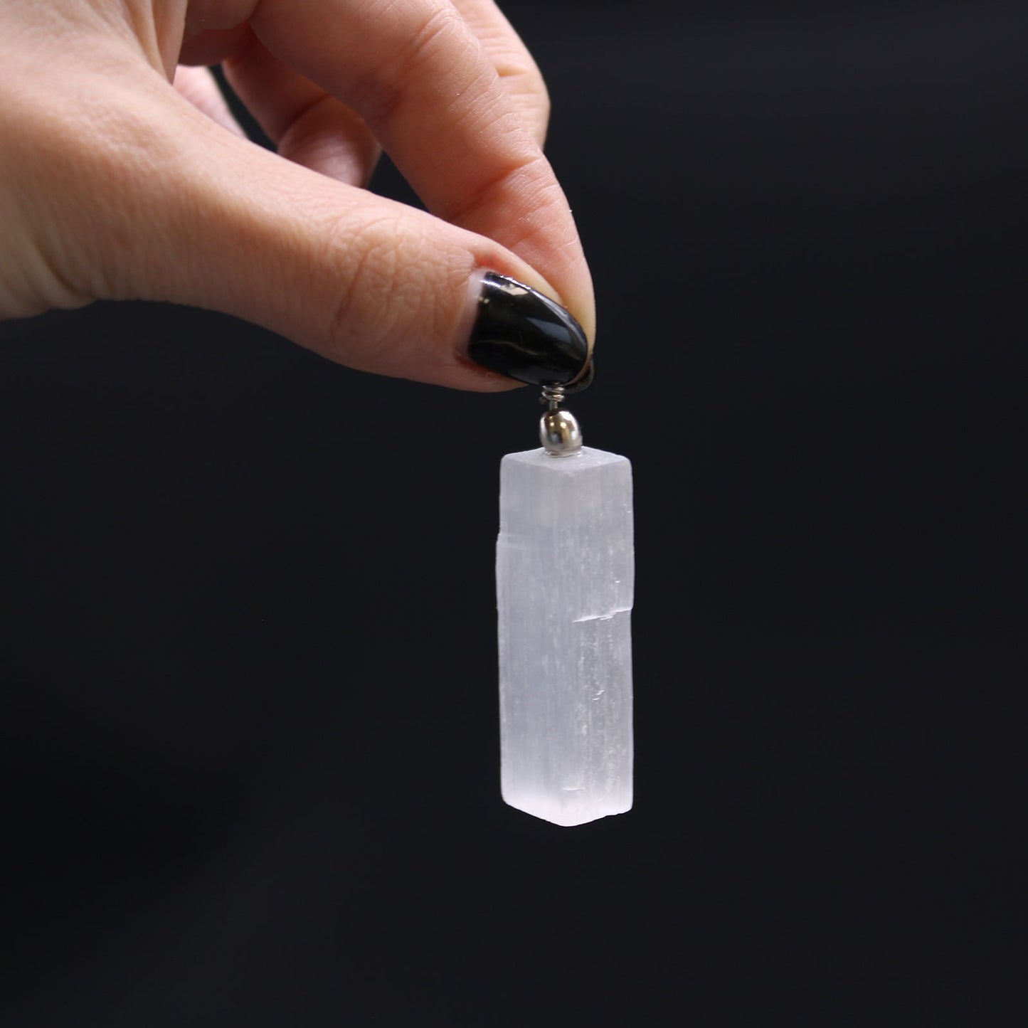 Selenite Natural Pendant product packaging on clean background from Quintessential Holistic Health Ltd