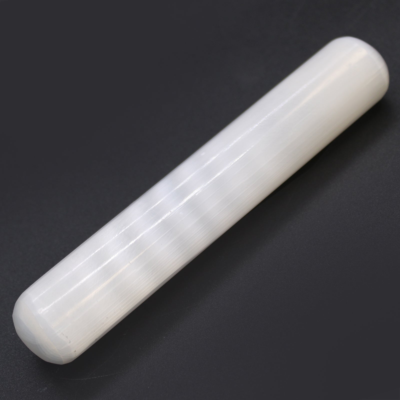 Rounded End Smooth Selenite Healing Wand product packaging on clean background from Quintessential Holistic Health Ltd