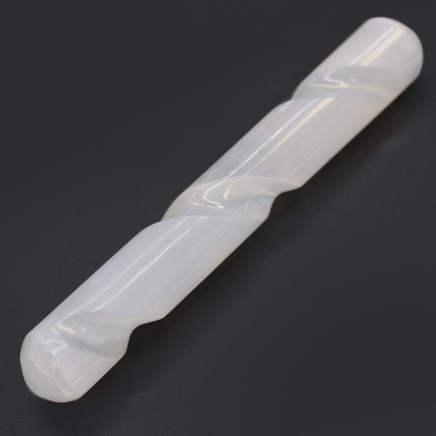 Rounded End Selenite Spiral Healing Wand product packaging on clean background from Quintessential Holistic Health Ltd