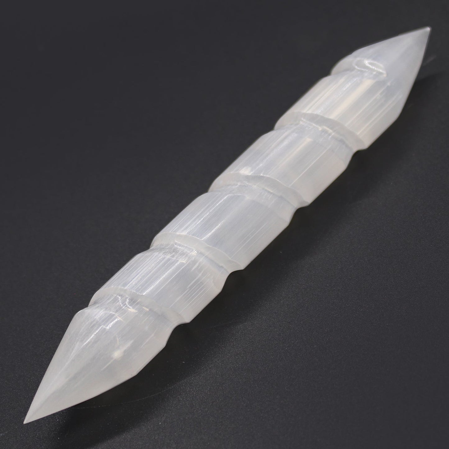 Pointed End Selenite Spiral Healing Wand product packaging on clean background from Quintessential Holistic Health Ltd
